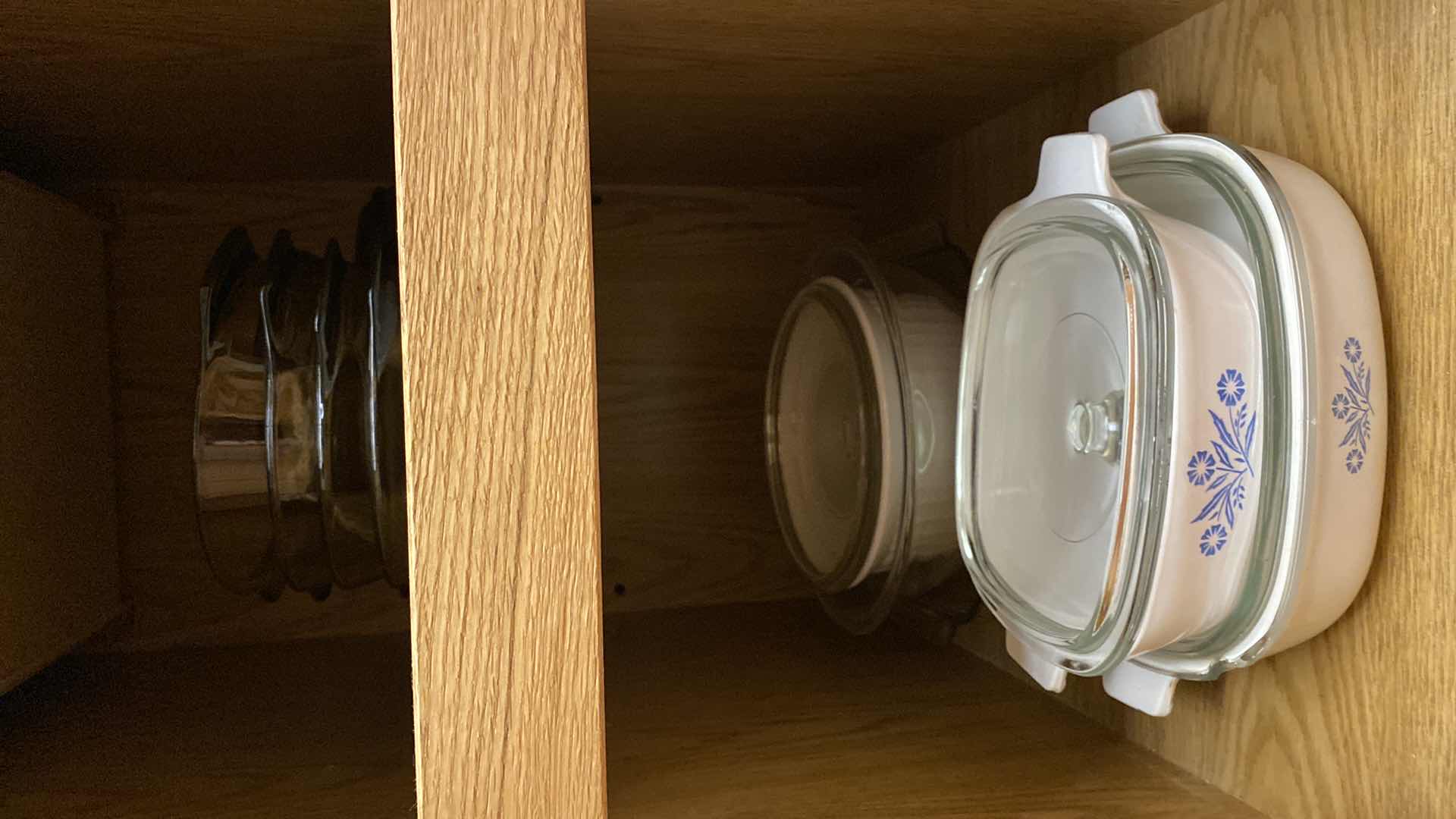 Photo 1 of CONTENTS OF KITCHEN CABINET PYREX AND CORNING WARE