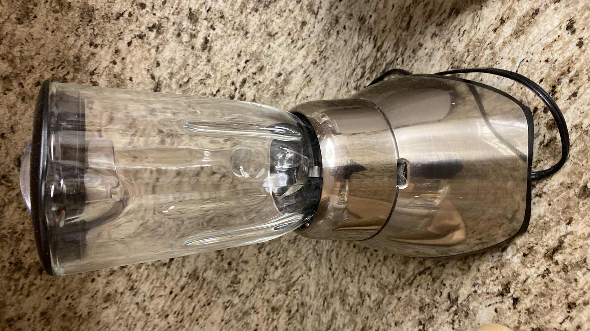 Photo 1 of CONTENTS KITCHEN CABINET OSTER BLENDER