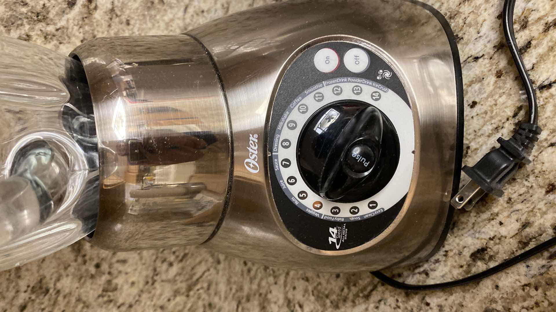 Photo 1 of CONTENTS KITCHEN CABINET OSTER BLENDER