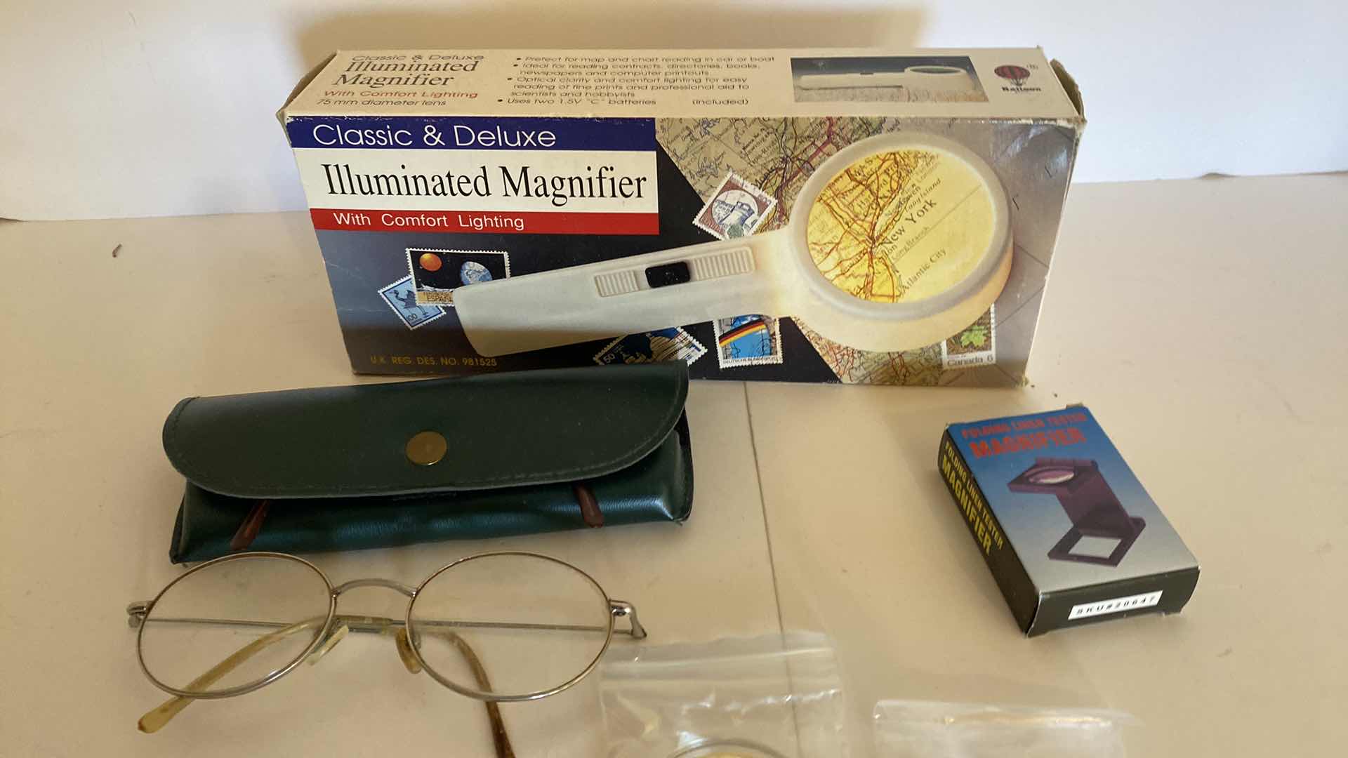 Photo 1 of MAGNIFIERS READING GLASSES AND GOLD COLOR COINS WITH BUBLE VERSE ISIAH 40:31