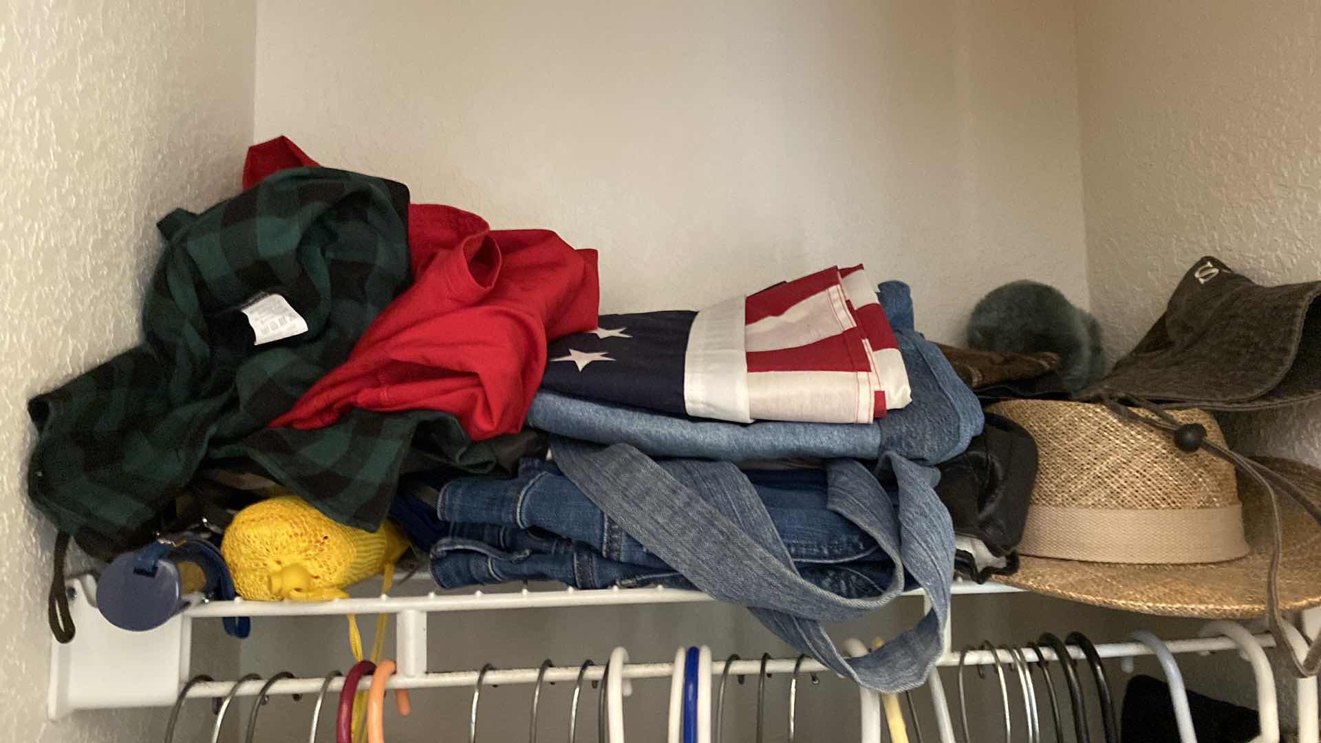 Photo 1 of CONTENTS OF ENTRY CLOSET SIZE LARGE AND X-LARGE WOMENS