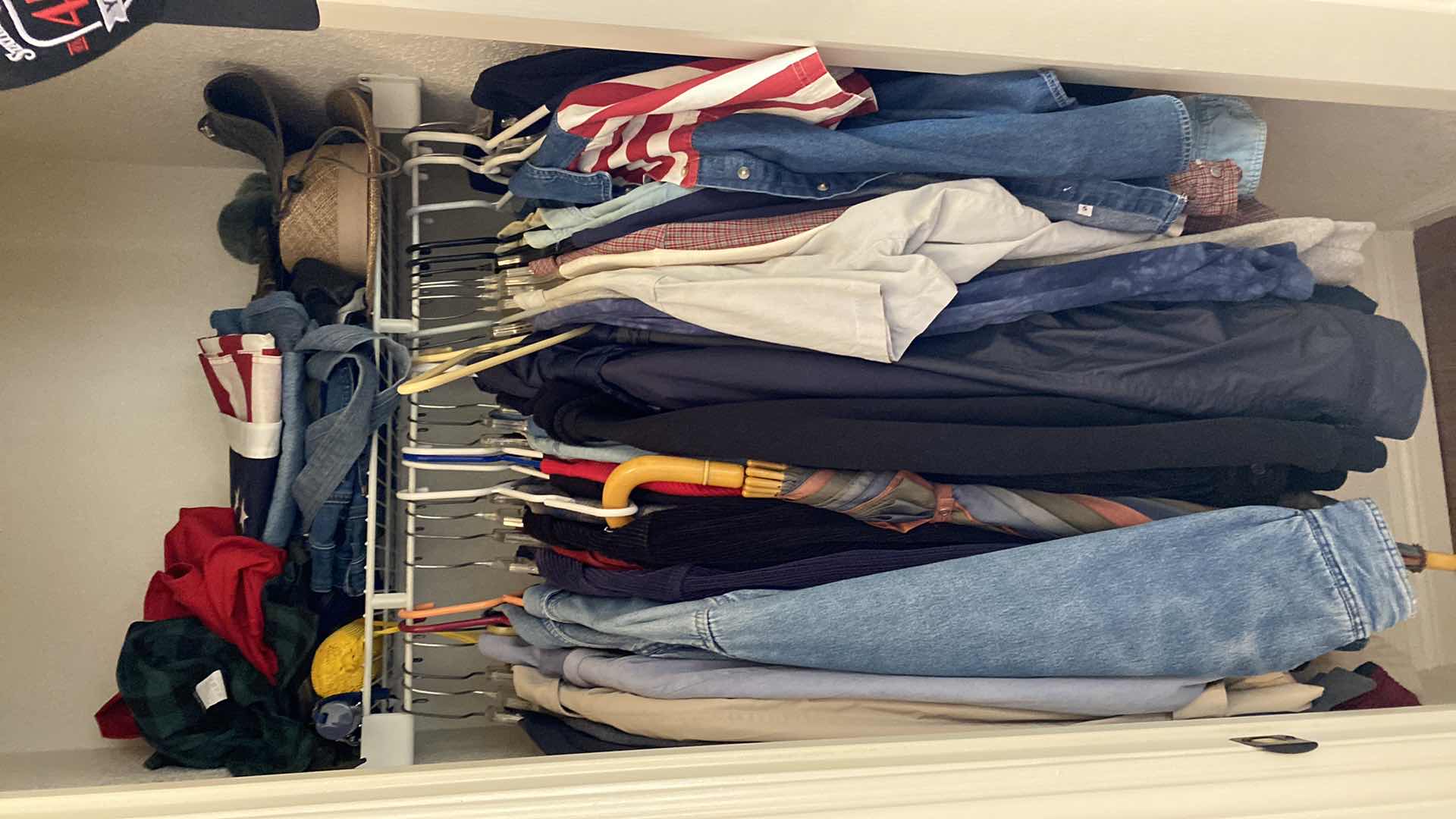 Photo 1 of CONTENTS OF ENTRY CLOSET SIZE LARGE AND X-LARGE WOMENS