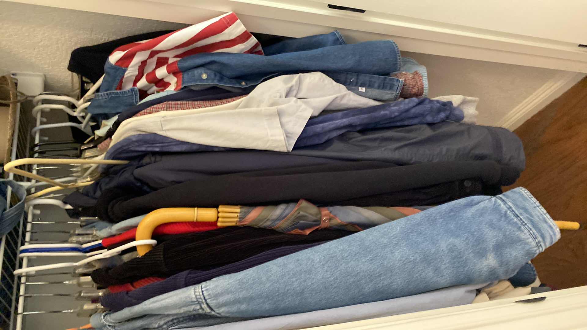 Photo 2 of CONTENTS OF ENTRY CLOSET SIZE LARGE AND X-LARGE WOMENS