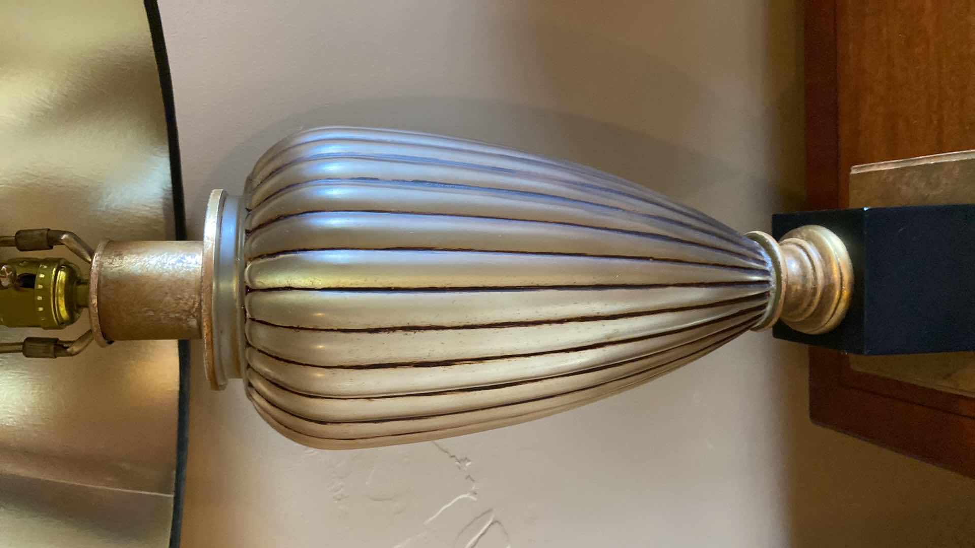 Photo 1 of GOLD GLASS TABLE LAMP WITH BLACK SHADE H 34”