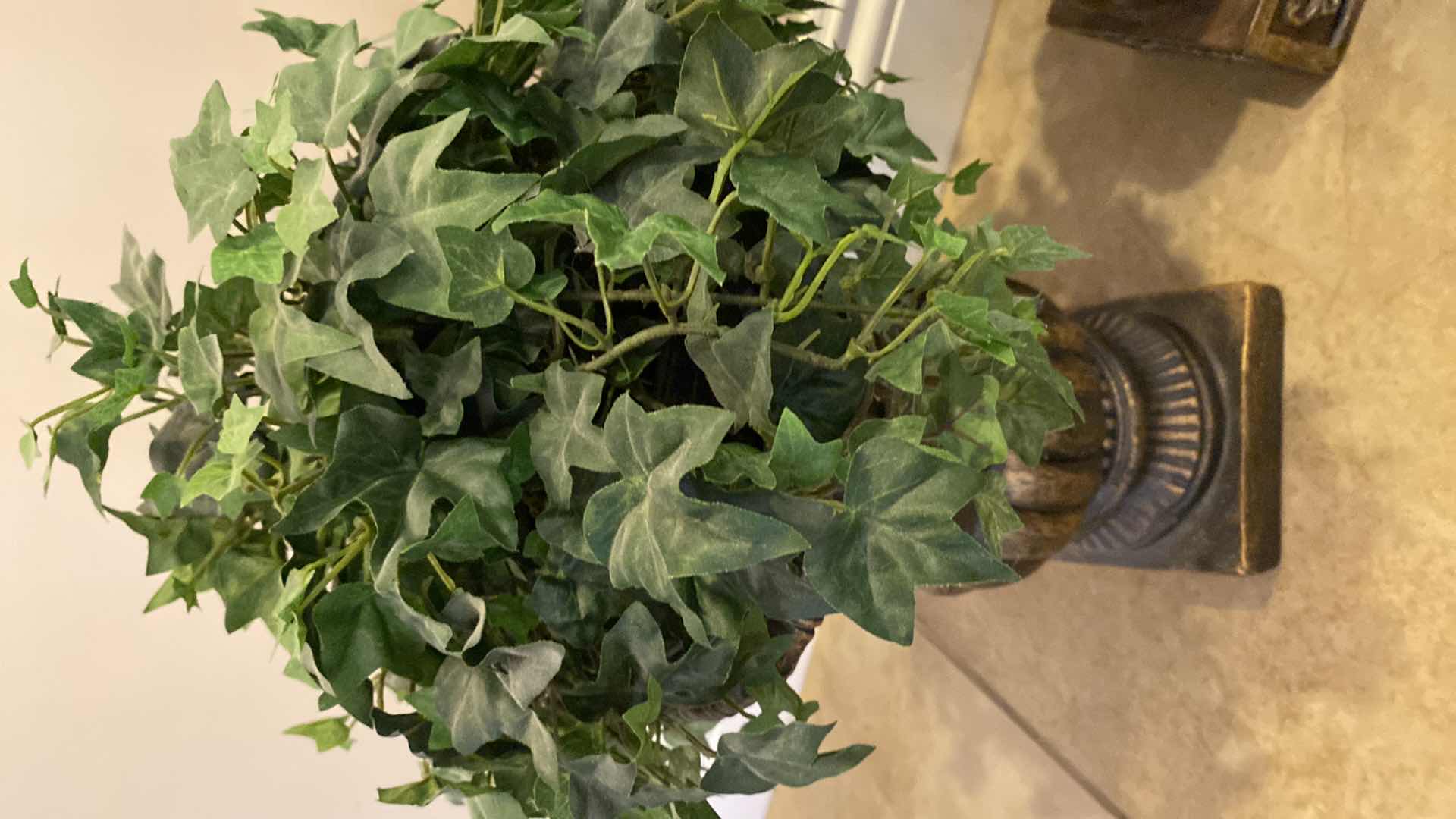 Photo 1 of 2 FAUX PLANTS IN URNS AND CORBEL H 15 1/2”