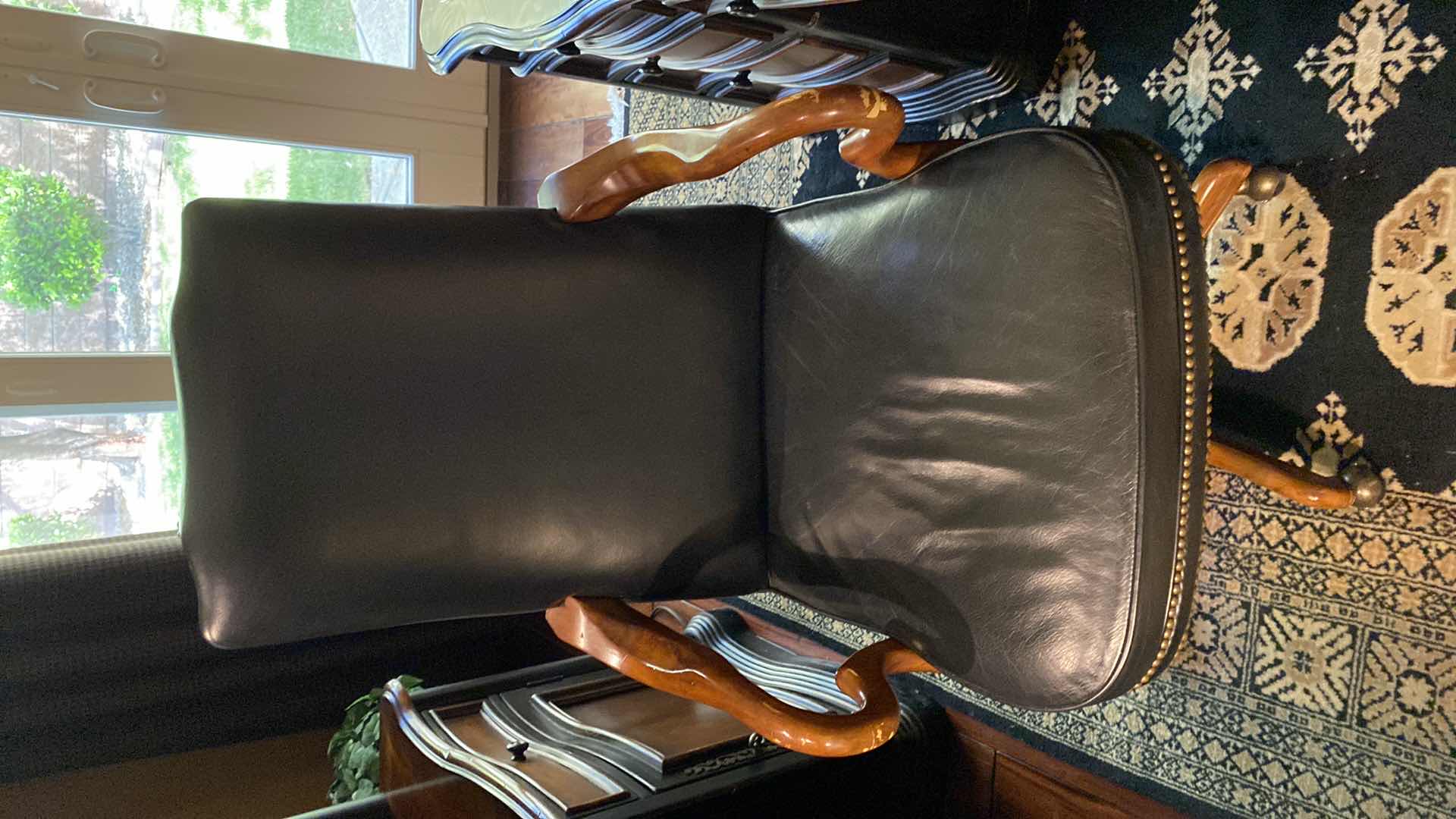 Photo 1 of BLACK LEATHER W WOOD ACCENTS SWIVEL EXECUTIVE DESK CHAIR