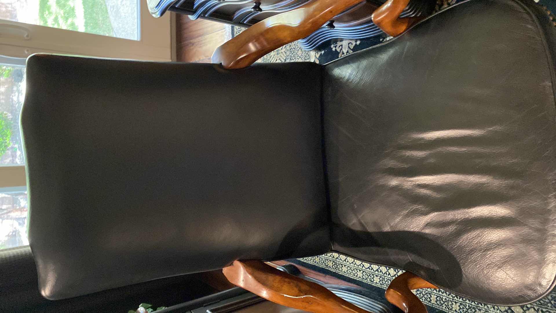 Photo 1 of BLACK LEATHER W WOOD ACCENTS SWIVEL EXECUTIVE DESK CHAIR