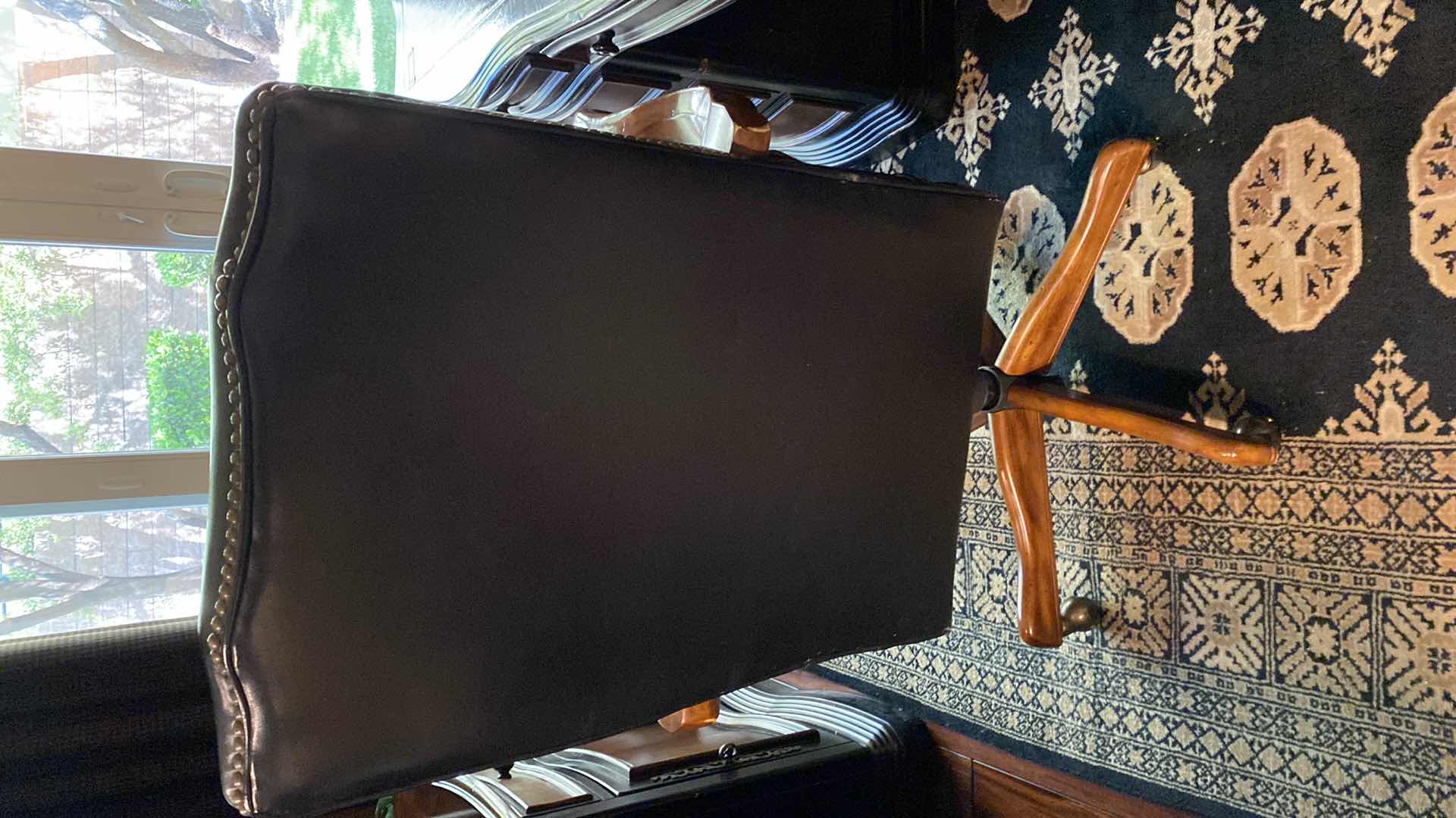 Photo 1 of BLACK LEATHER W WOOD ACCENTS SWIVEL EXECUTIVE DESK CHAIR