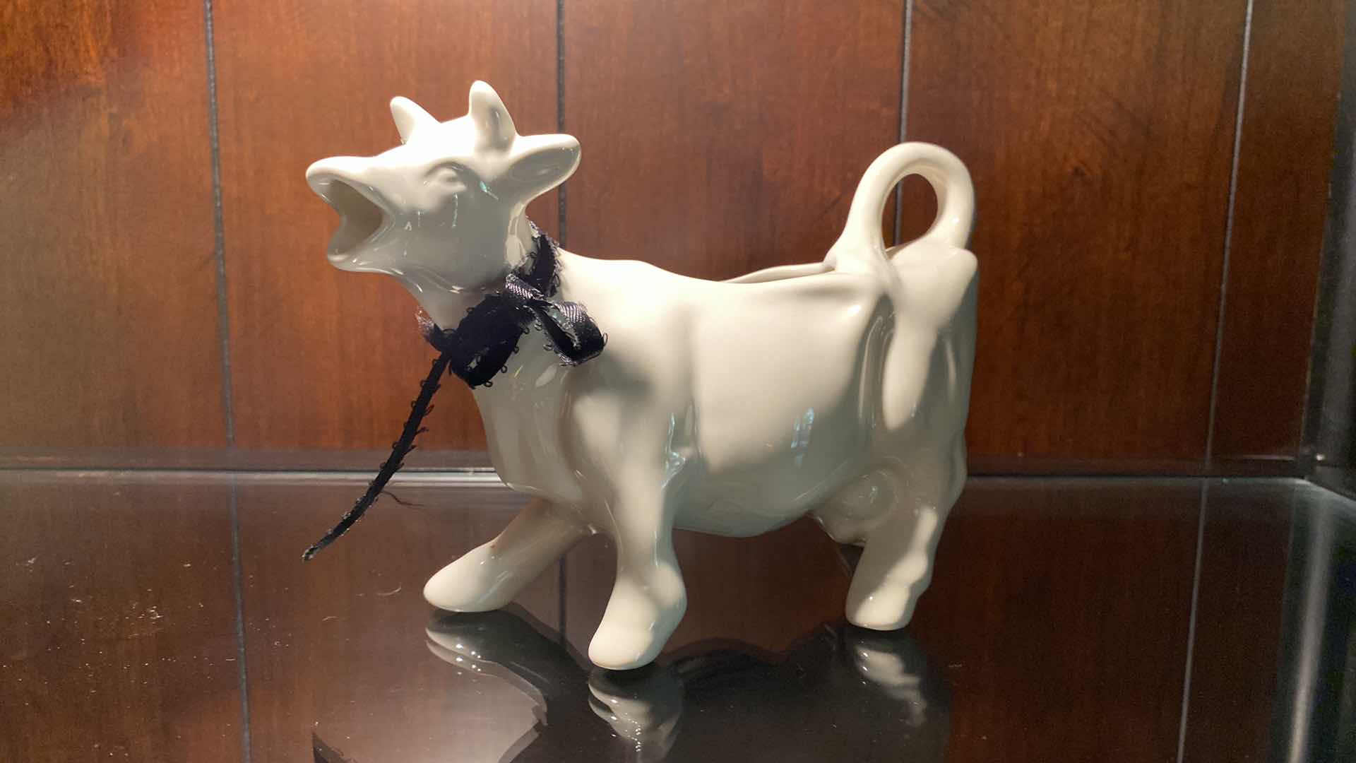 Photo 1 of CERAMIC COW AND AZ CARDINALS FOOTBALL SOUVENIR