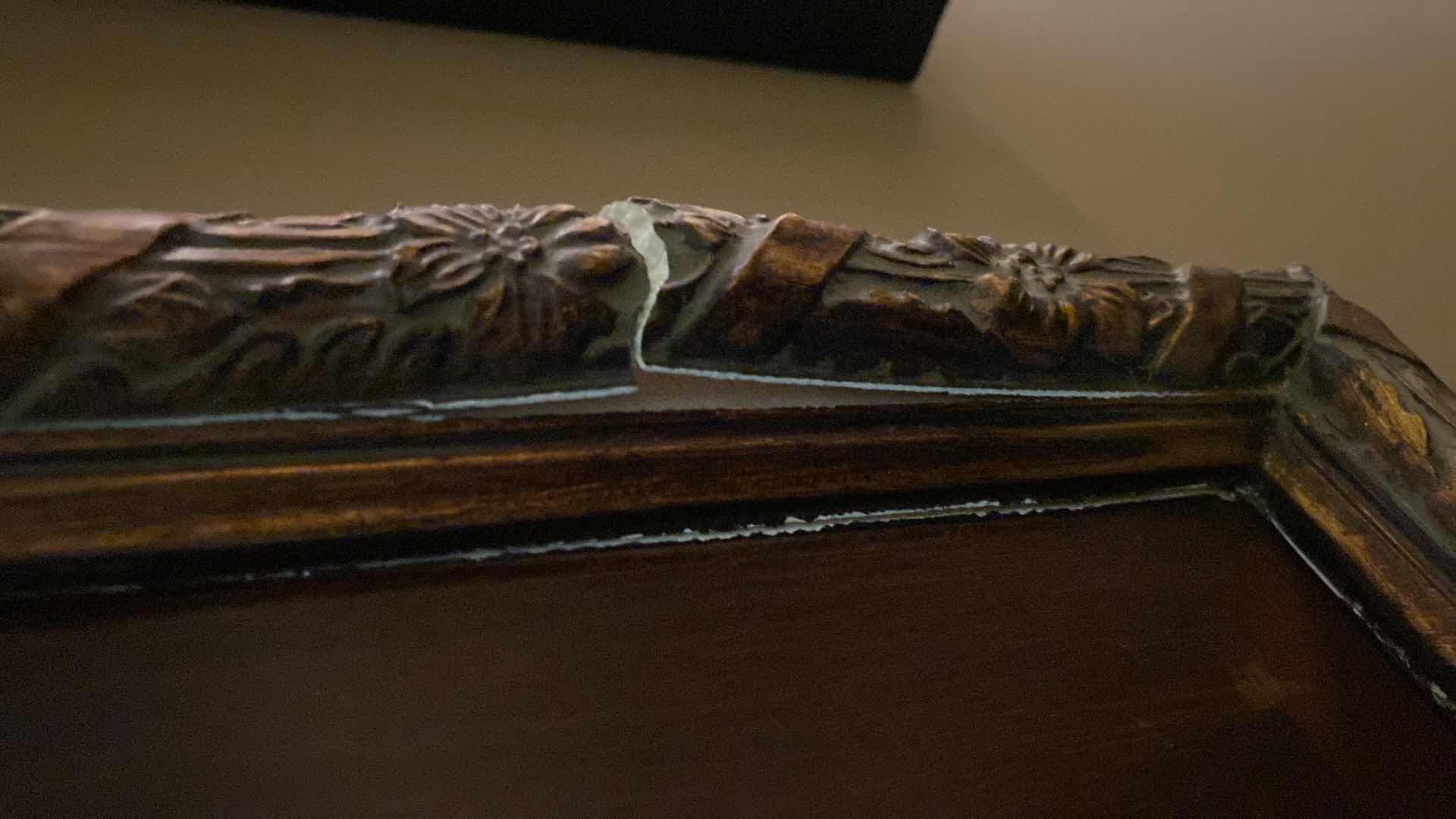 Photo 1 of RESIN FRAMED BEVELED MIRROR 52” x 40” (frame is damaged to see pictures)