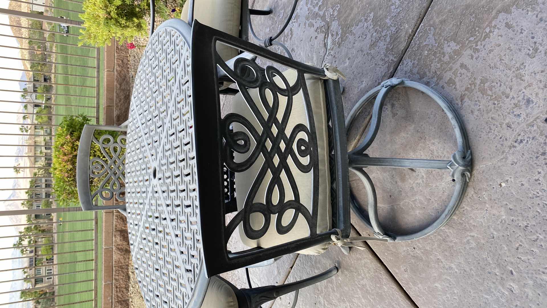 Photo 4 of ALUMINUM 5 PIECE PATIO SET TABLE 48” x 29” AND 4 CHAIRS WITH CUSHIONS