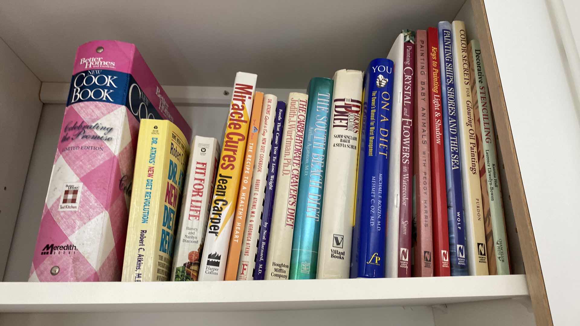 Photo 1 of CONTENTS OF KITCHEN CABINET COOK BOOKS