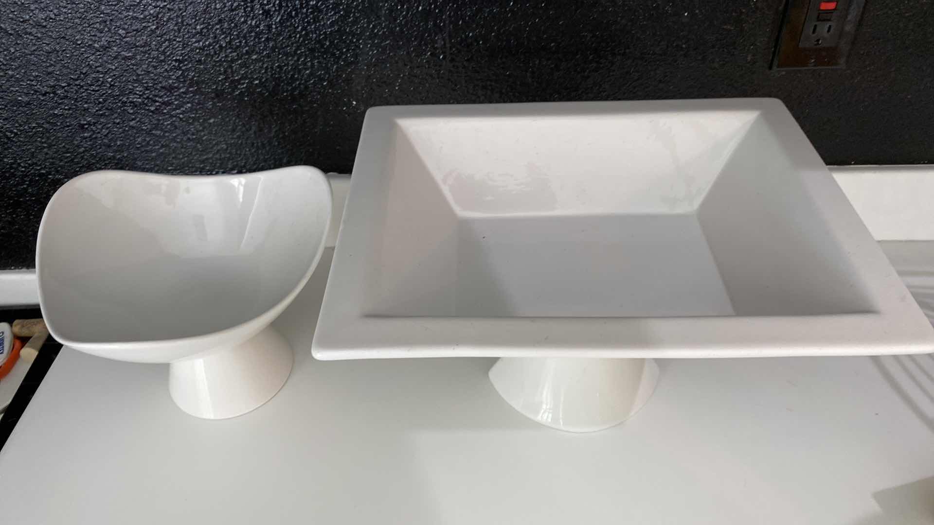 Photo 1 of CONTENTS OF KITCHEN CABINET SHELF - 2 PIECES OF WHITE CERAMIC SERVEWARE