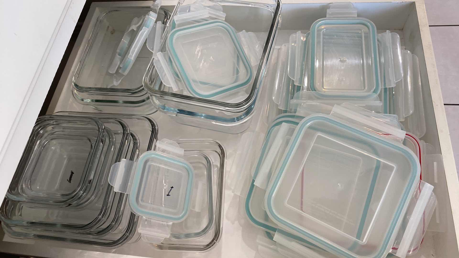 Photo 1 of CONTENTS OF KITCHEN CABINET SHELF - GLASS STORAGE