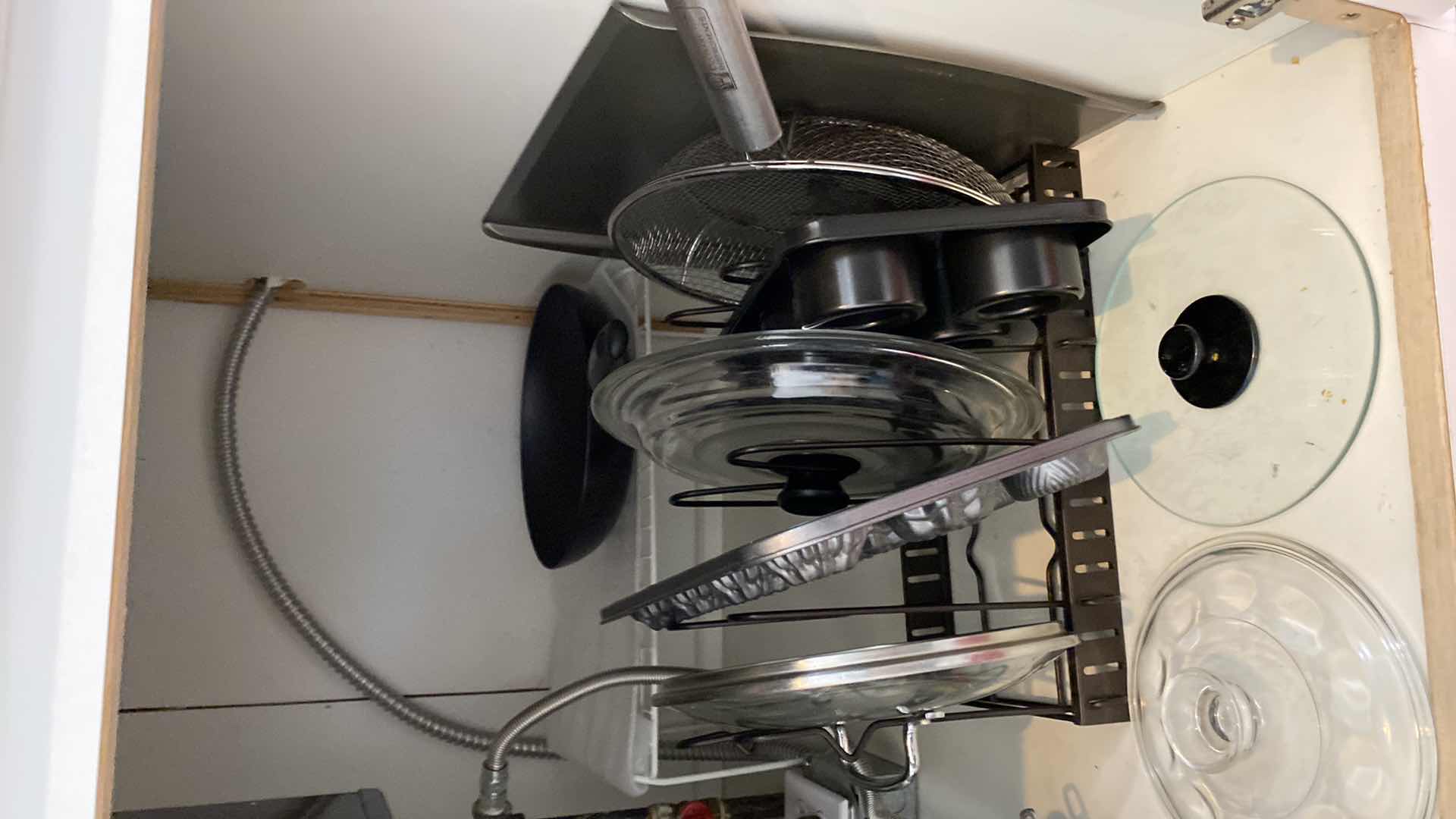 Photo 1 of CONTENTS OF KITCHEN CABINET PANS BAKEWARE LIDS INCLUDED ORGANIZERS