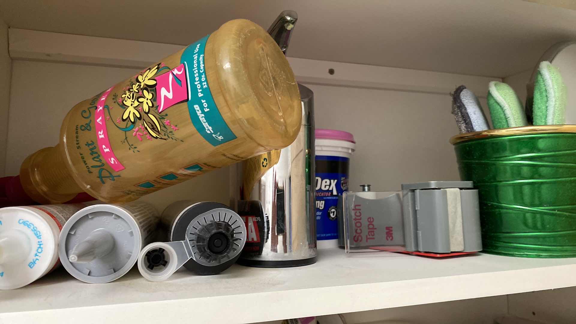 Photo 1 of CONTENTS OF LAUNDRY ROOM CABINET IRON TAPE AND MORE