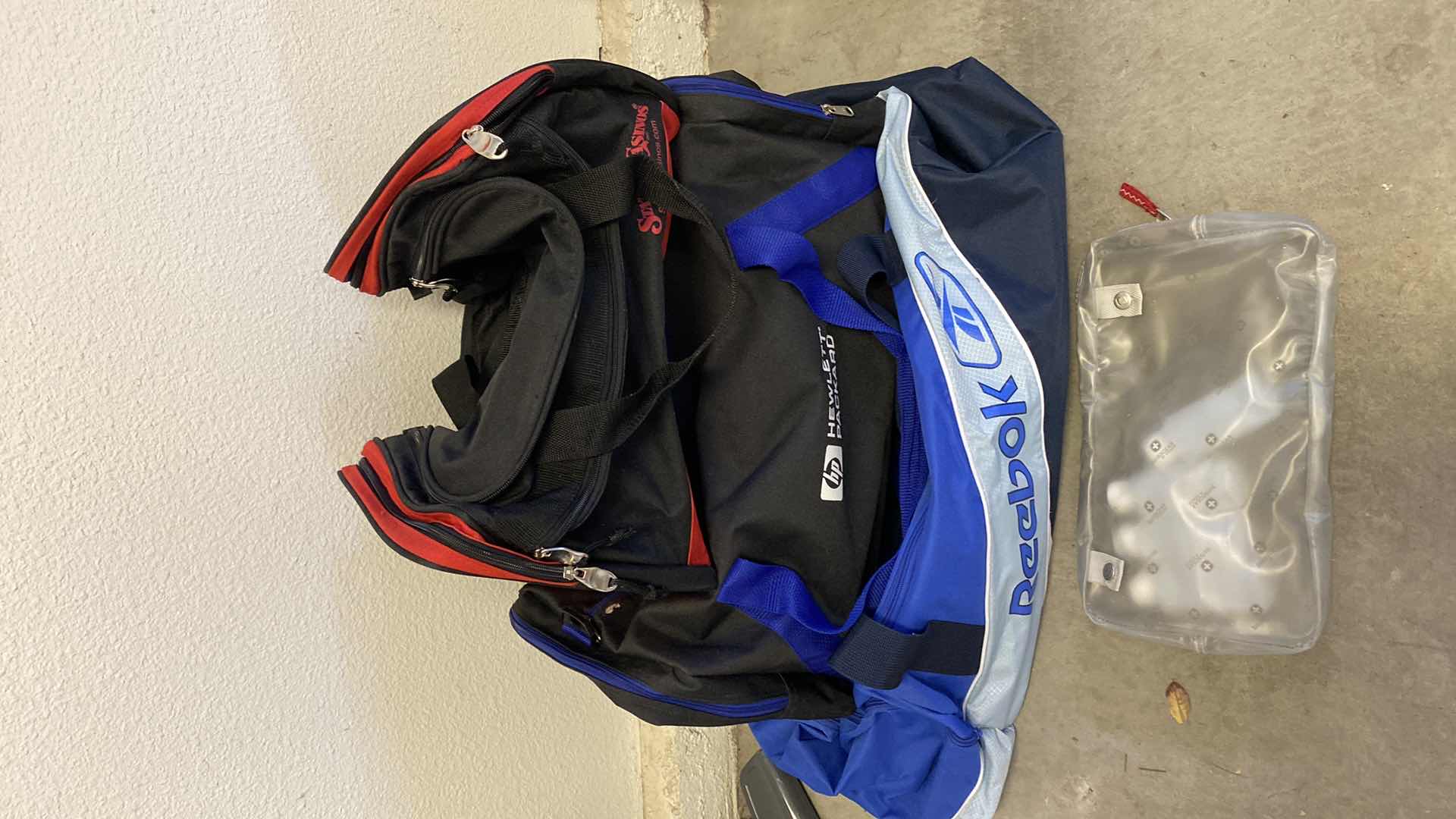 Photo 1 of 3 DUFFLE BAGS AND TRAVEL BOTTLES IN BAG