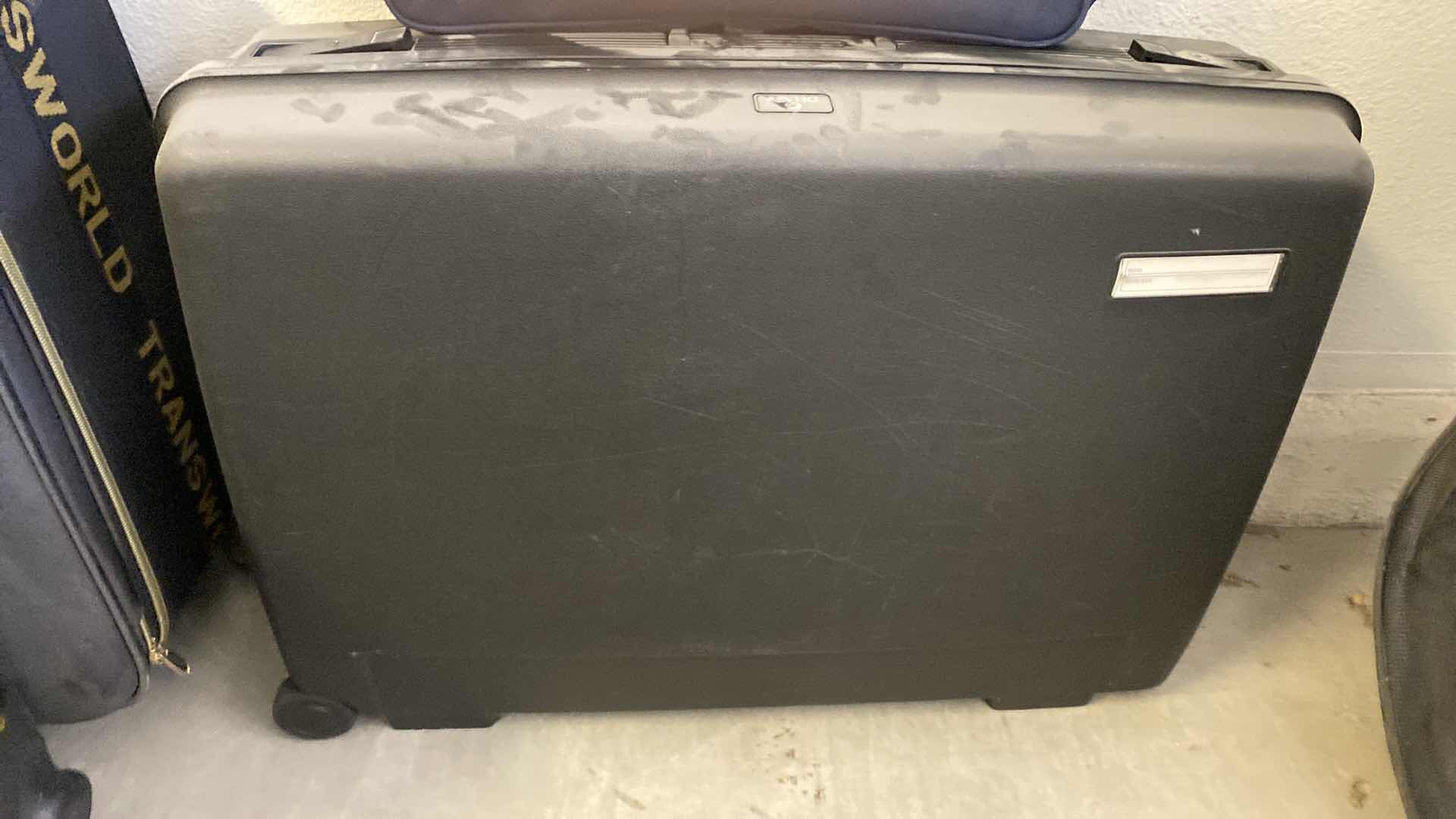 Photo 1 of DELSEY HARDSIDE SUITCASE AND 2 SODT SIDED BAGS