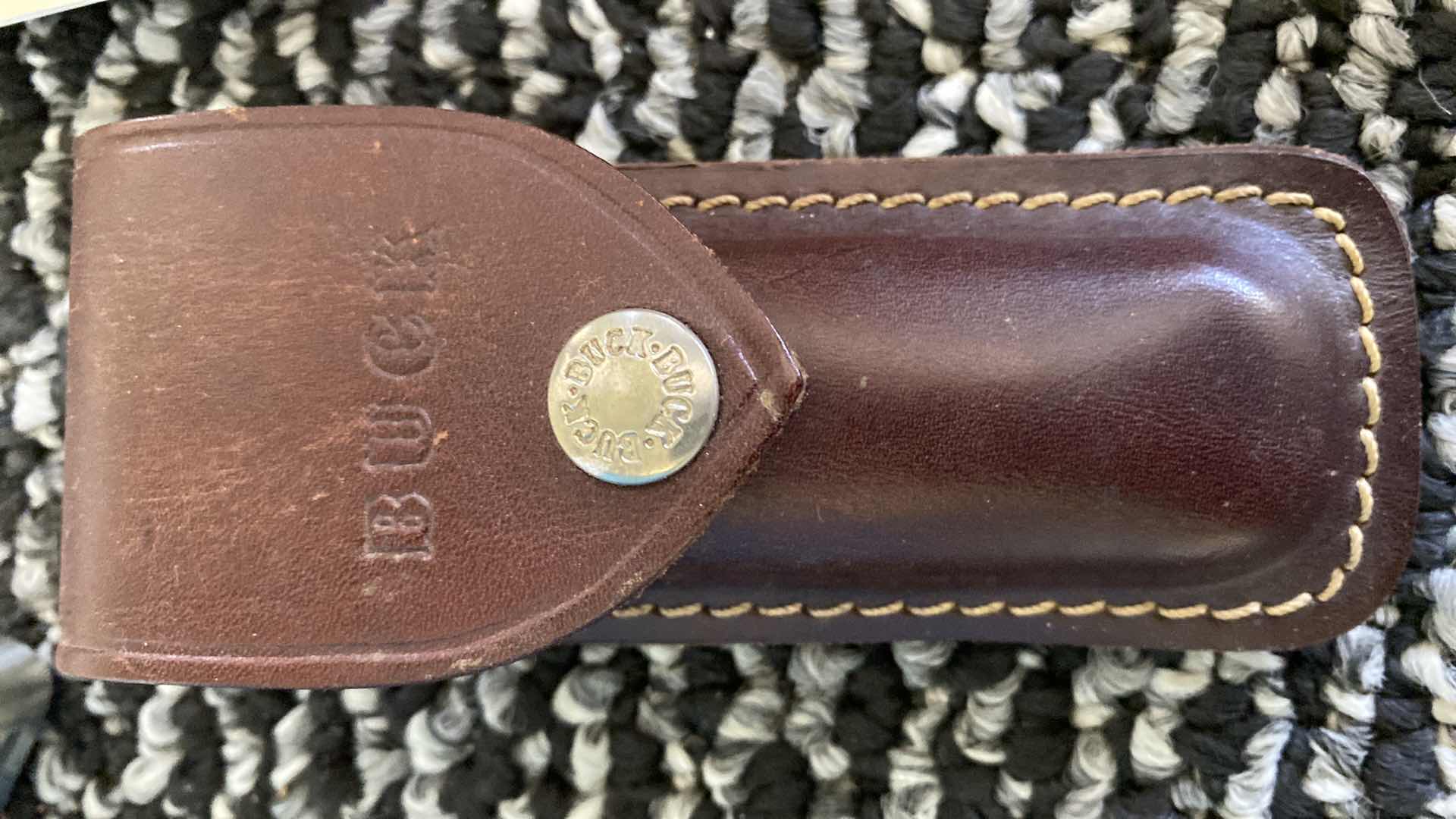 Photo 1 of BUCK KNIFE WITH SHEATH 7 1/2”