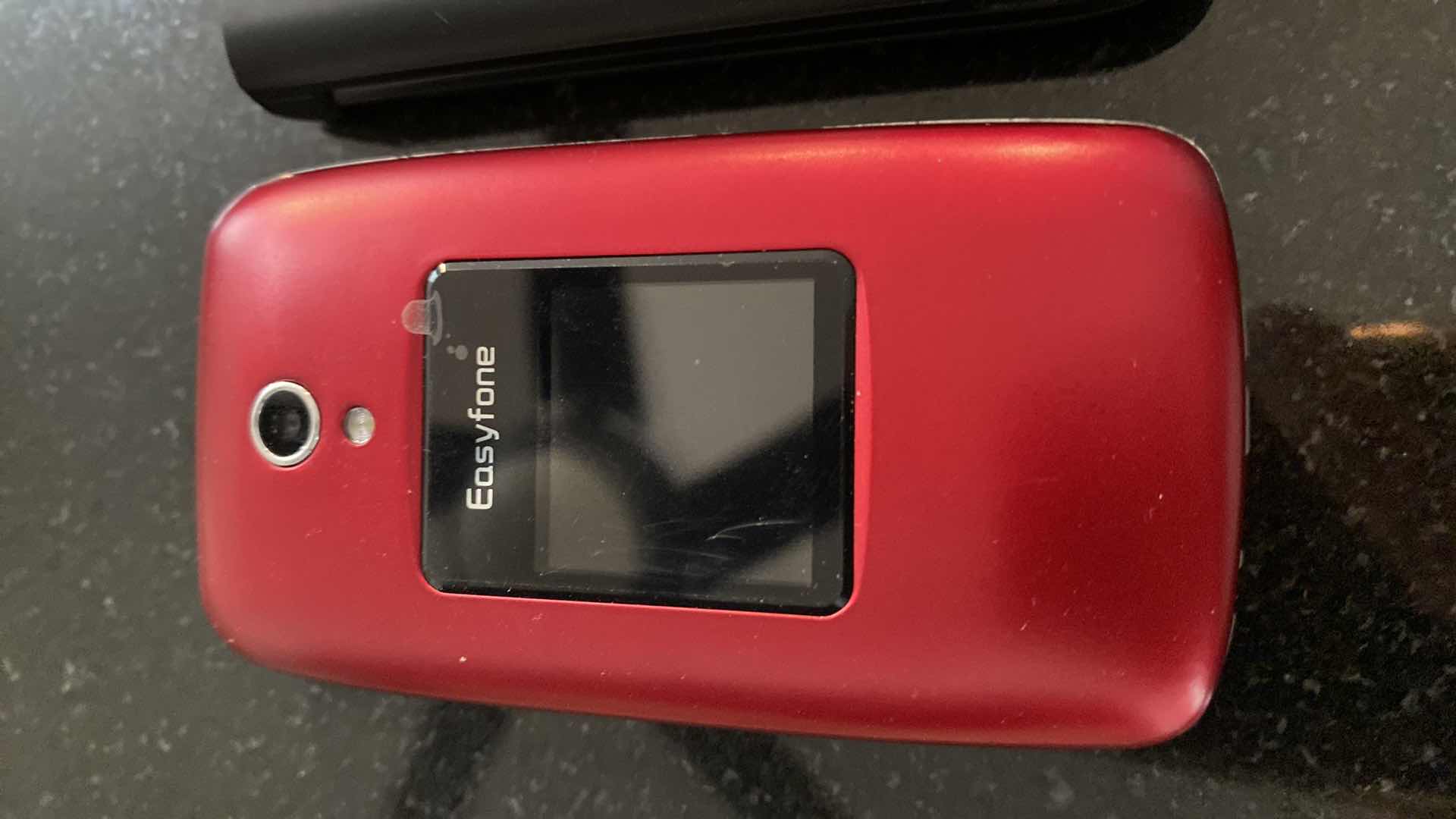 Photo 1 of COSTUME JEWELRY AND OLD CELL PHONES