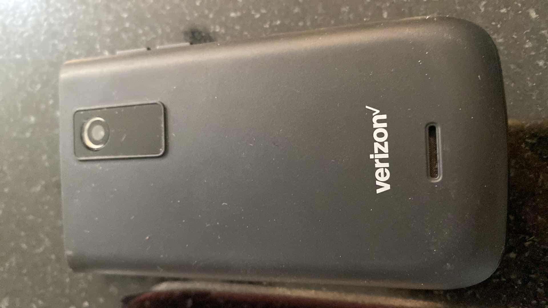 Photo 1 of COSTUME JEWELRY AND OLD CELL PHONES