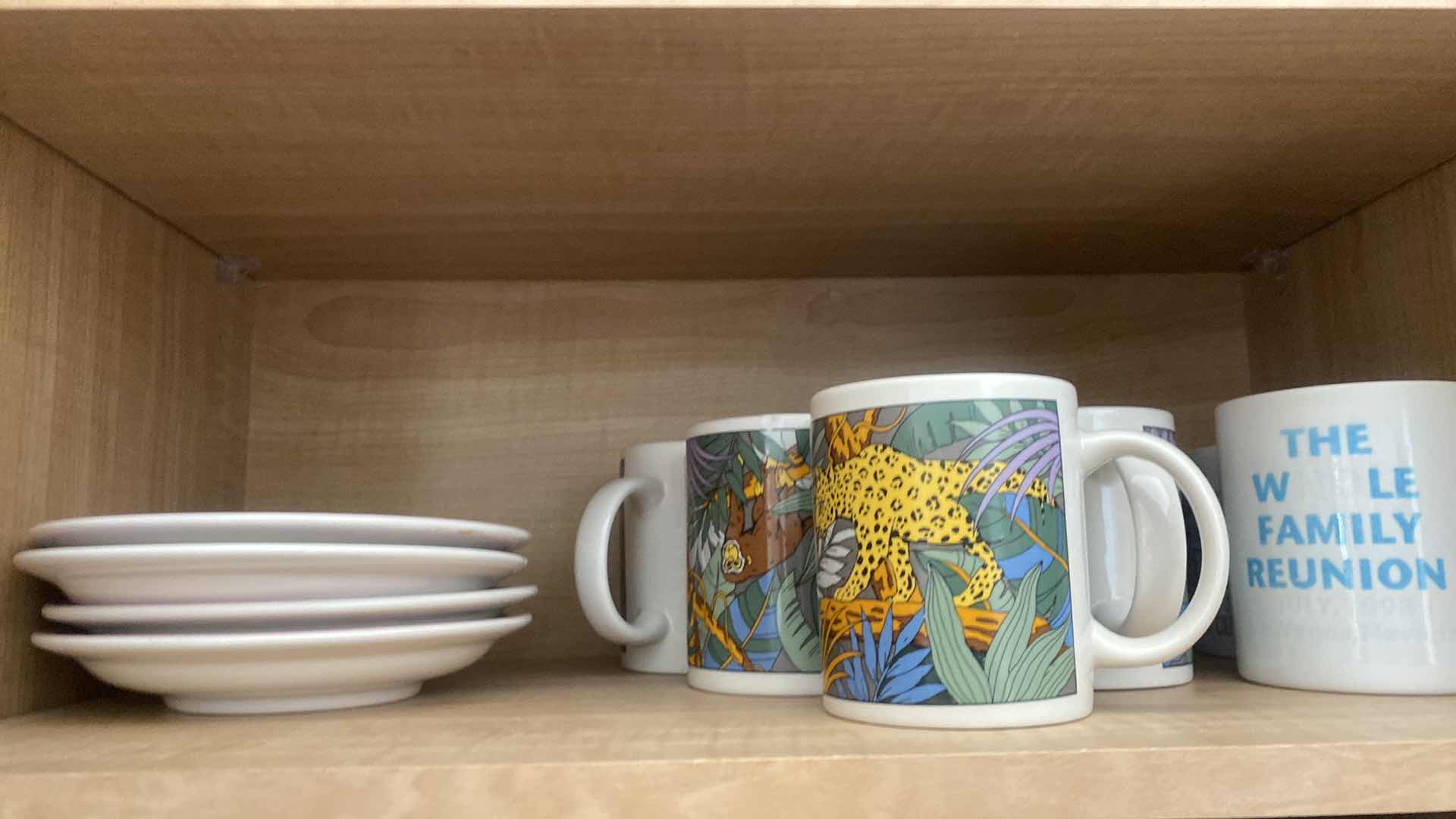 Photo 1 of CONTENTS KITCHEN CABINET- COFFEE CUPS