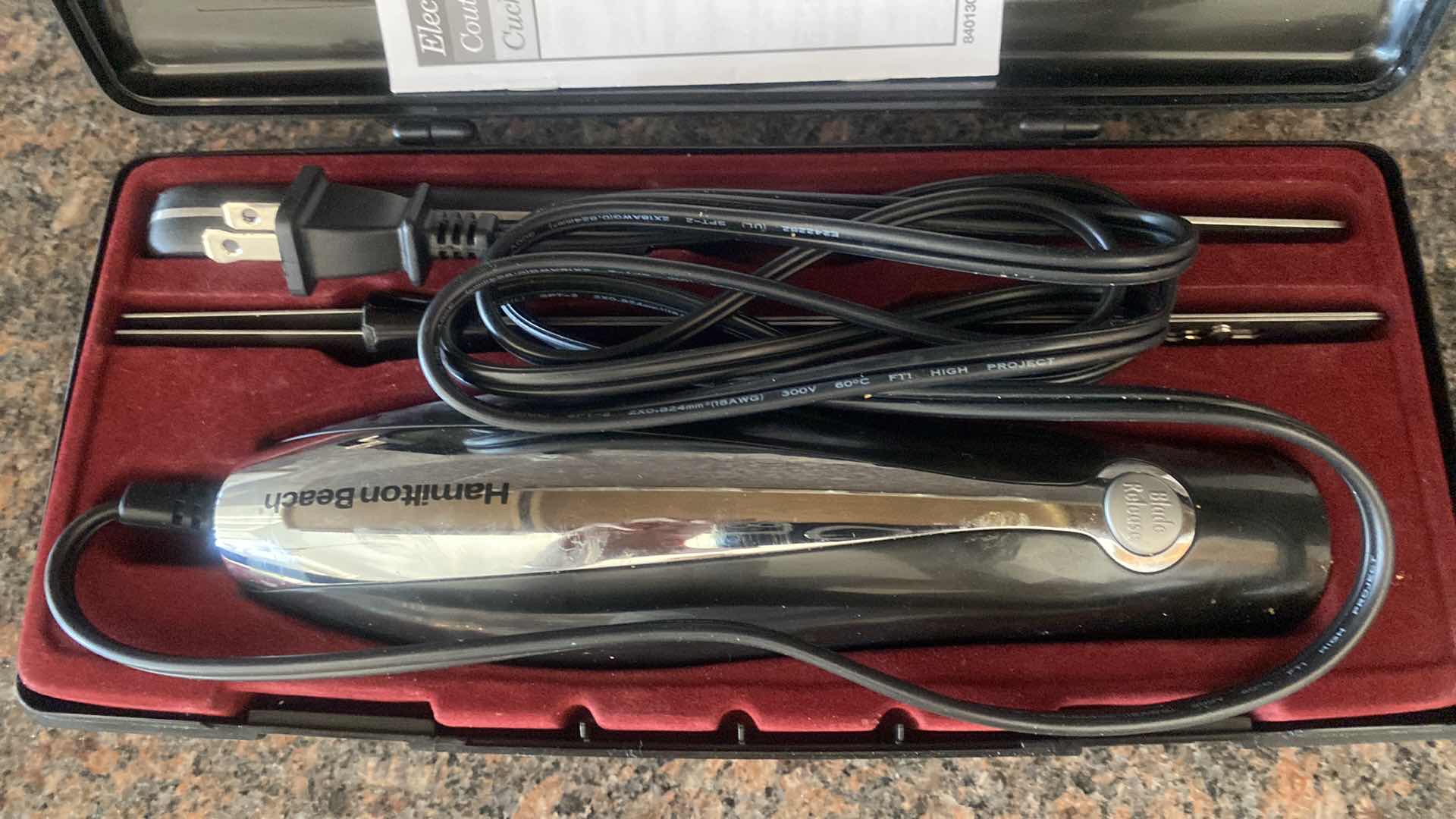 Photo 1 of CONTENTS KITCHEN CABINET- HAMILTON BEACH ELECTRIC KNIFE