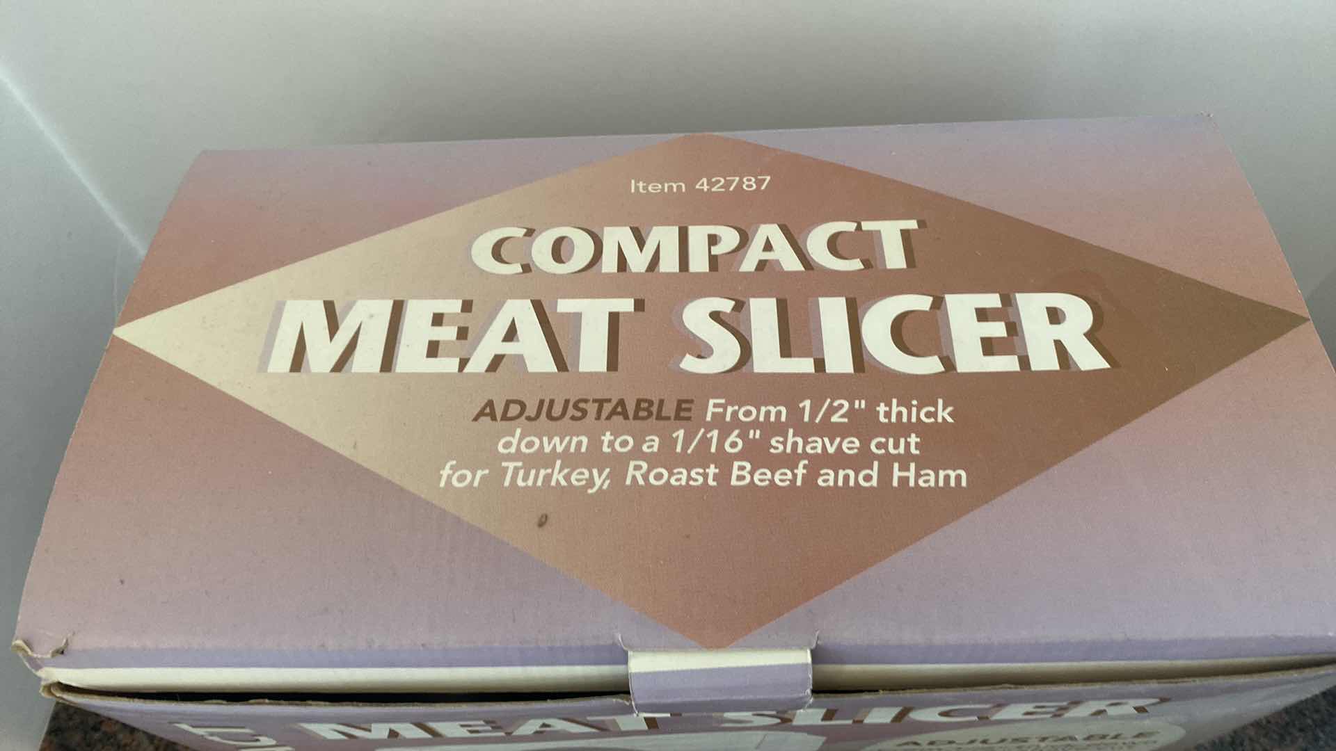 Photo 1 of COMPACT MEAT SLICER