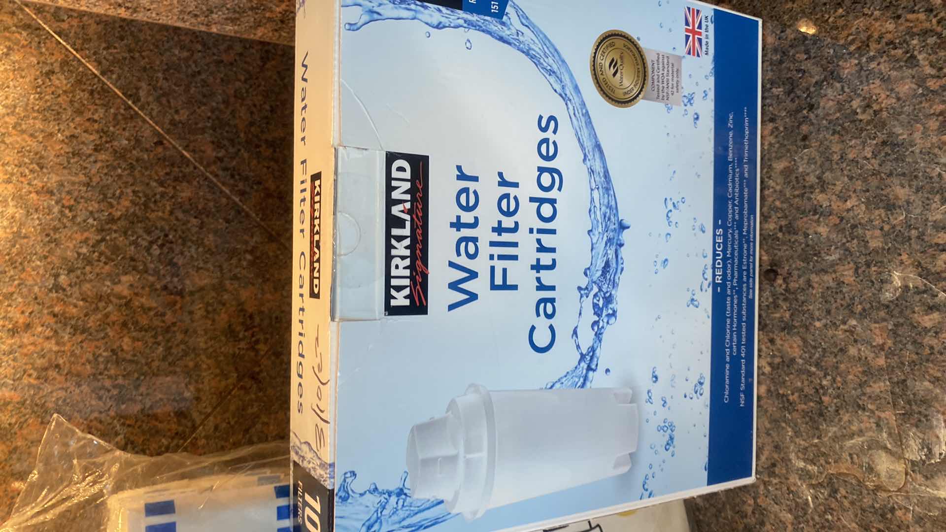 Photo 1 of BRITA & KIRKLAND WATER FILTERS AND PLASTIC TABLECLOTHS