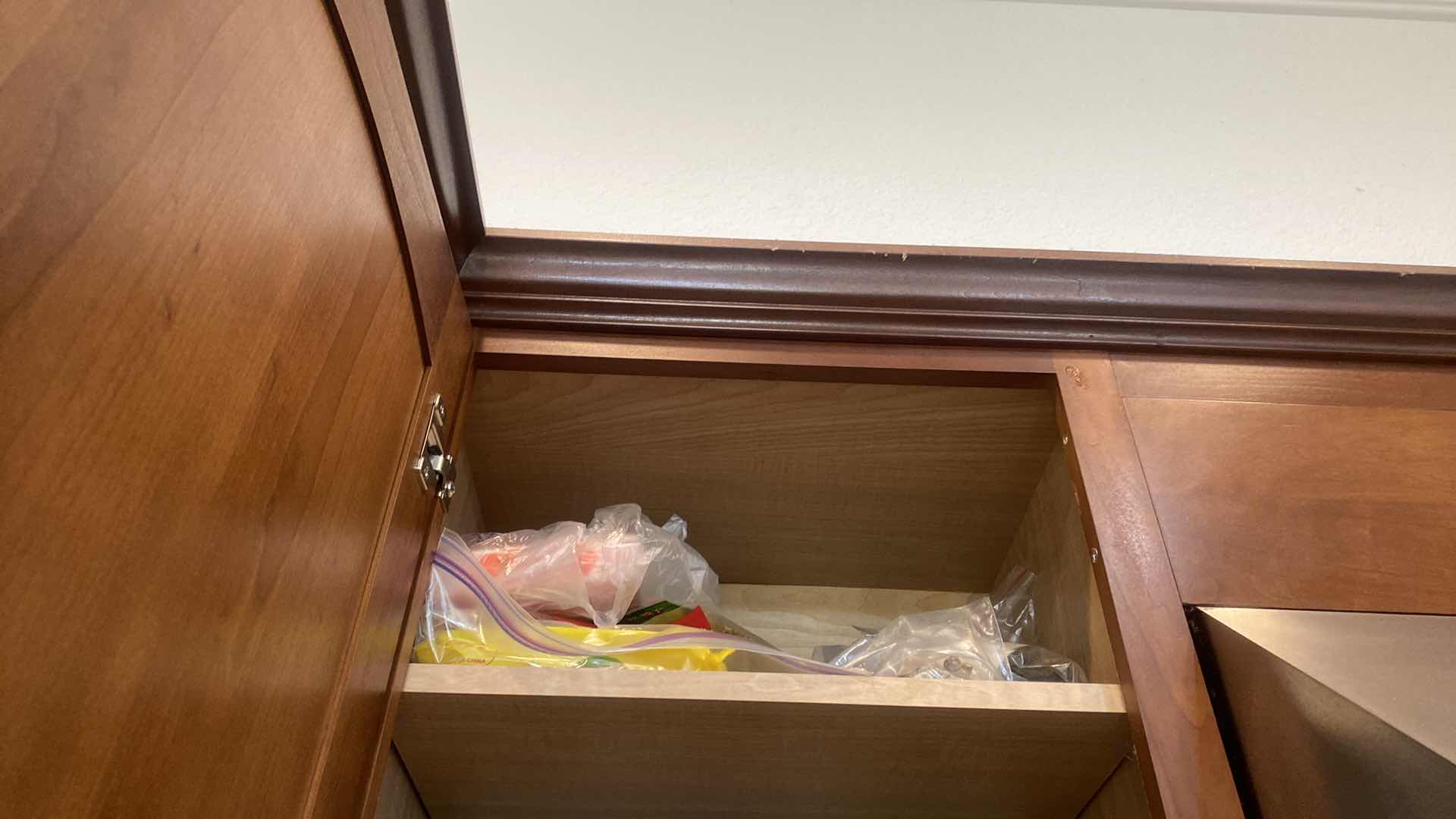 Photo 1 of CONTENTS OF KITCHEN CABINET - SPICES AND CANISTERS