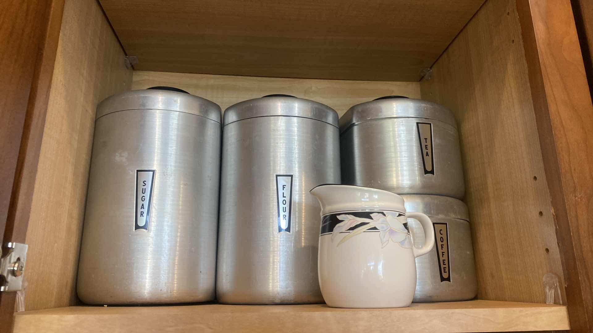 Photo 1 of CONTENTS OF KITCHEN CABINET - SPICES AND CANISTERS