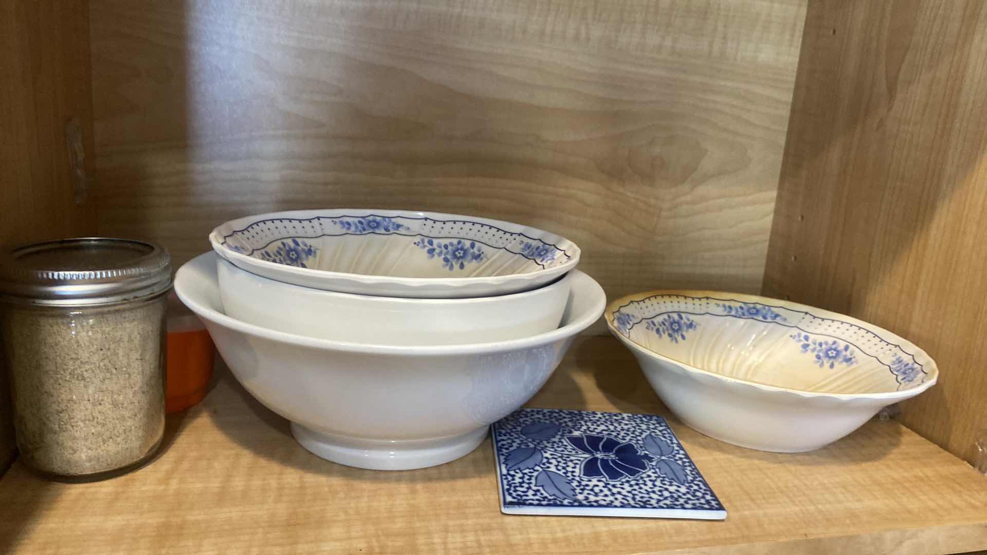 Photo 1 of CONTENTS OF KITCHEN CABINET - OILS AND MORE