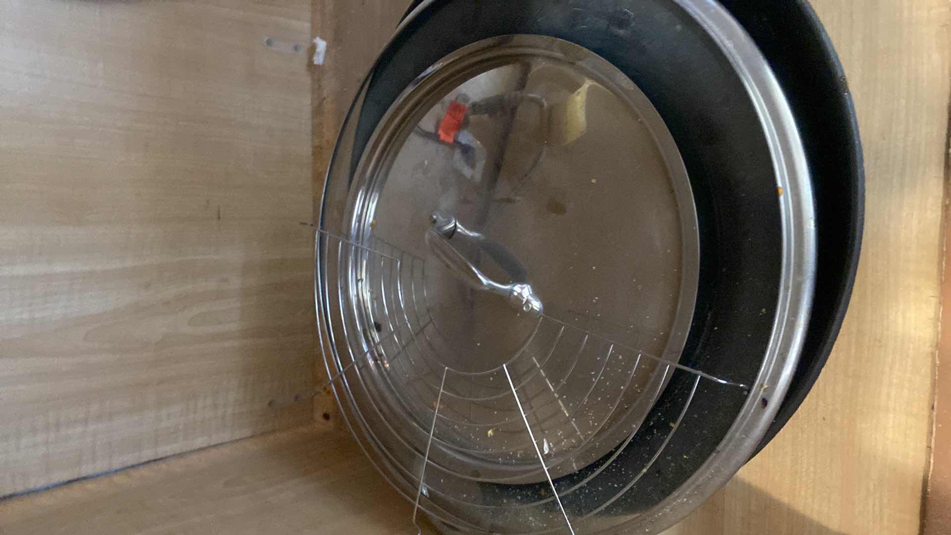 Photo 1 of CONTENTS OF KITCHEN CABINET - CUISINART PAN WITH LID AND A WOK