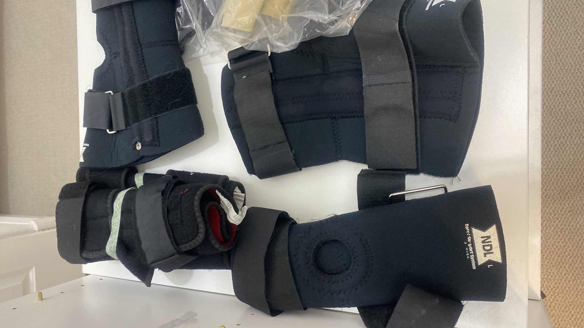 Photo 1 of ASSORTED KNEE BRACES