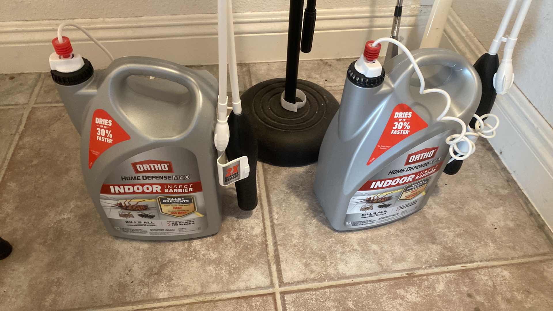 Photo 1 of CONTENTS HALL TO GARAGE CLOSET - MENS CLOTHING SIZES L AND XL & BUG SPRAY