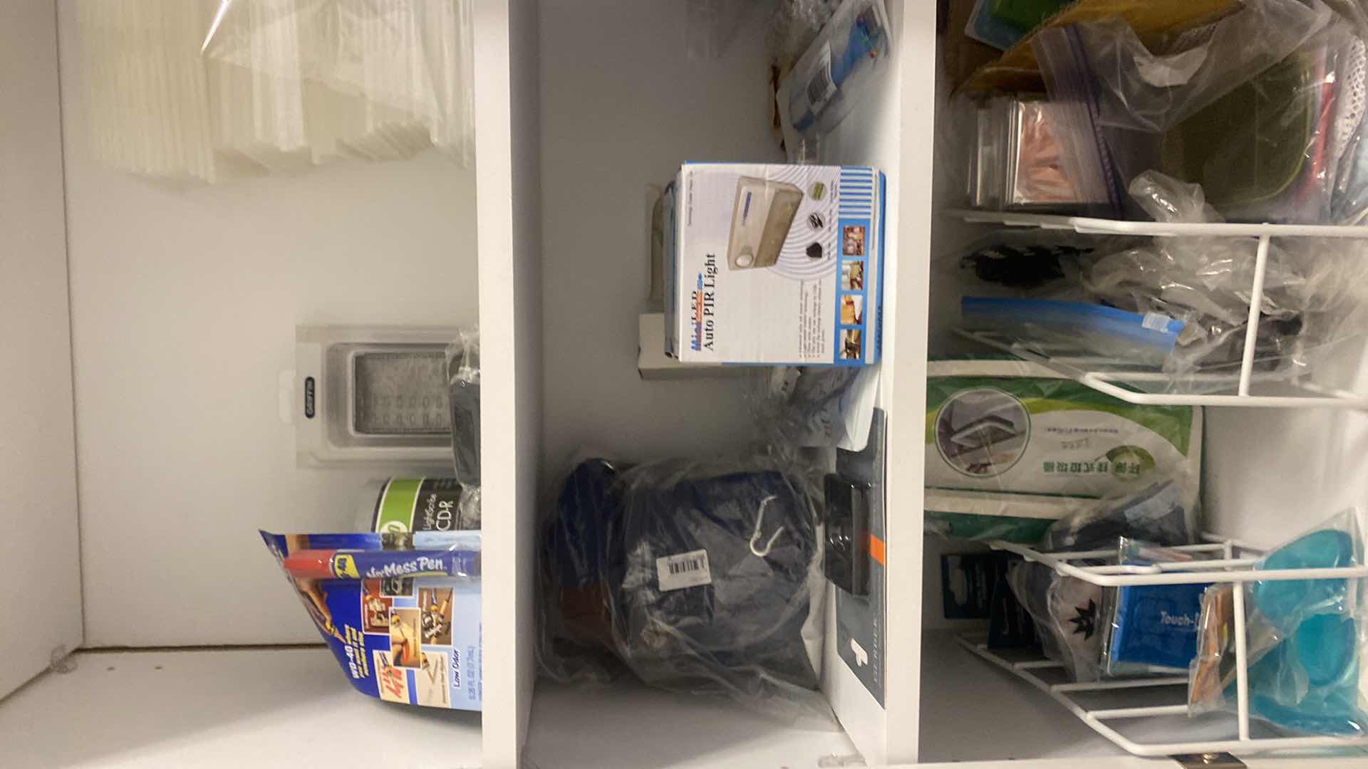 Photo 1 of CONTENTS LAUNDRY ROOM CABINET