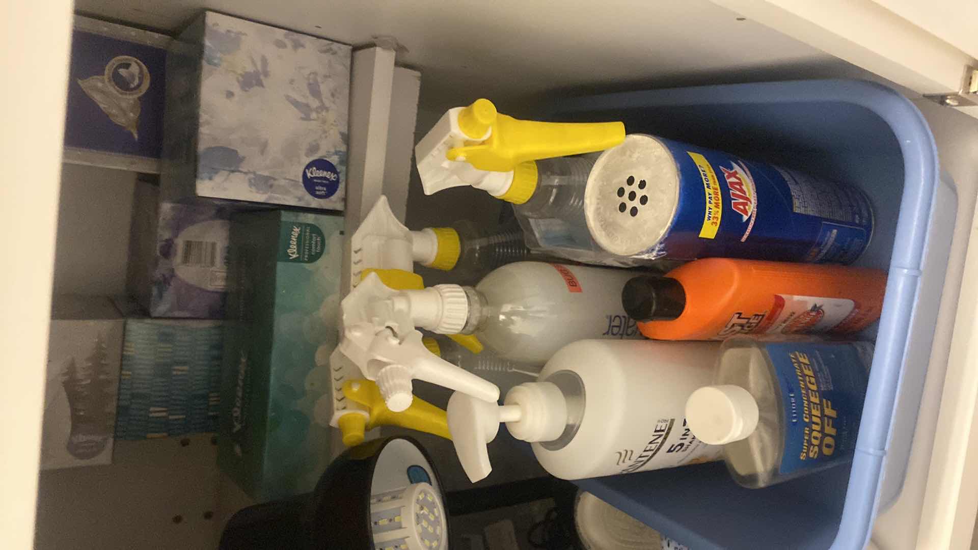 Photo 1 of CONTENTS LAUNDRY ROOM CABINET ASSORTED ITEMS