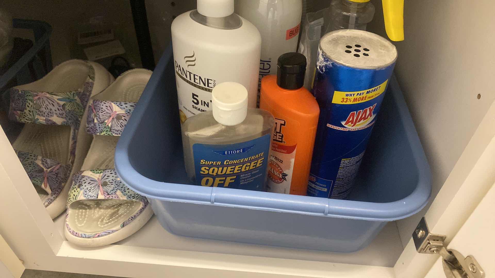 Photo 1 of CONTENTS LAUNDRY ROOM CABINET ASSORTED ITEMS