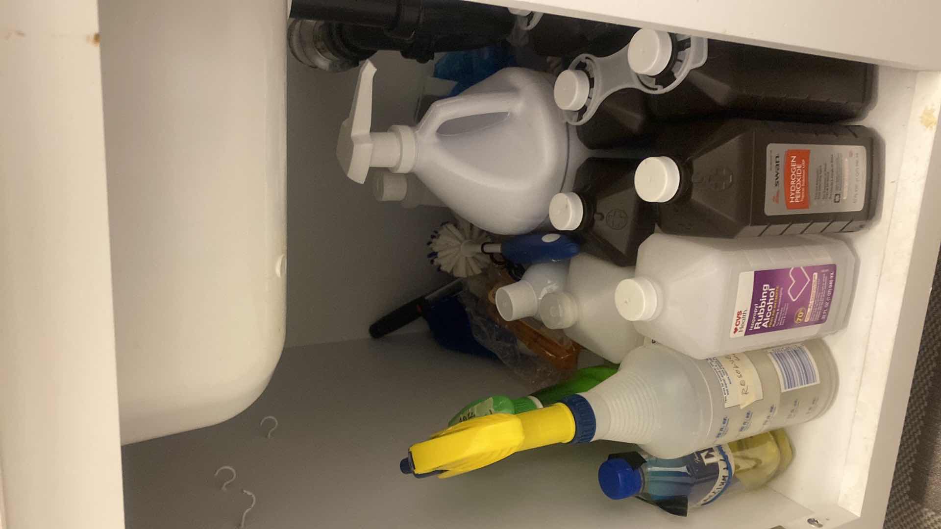 Photo 1 of CONTENTS LAUNDRY ROOM CABINET CLEANING ITEMS