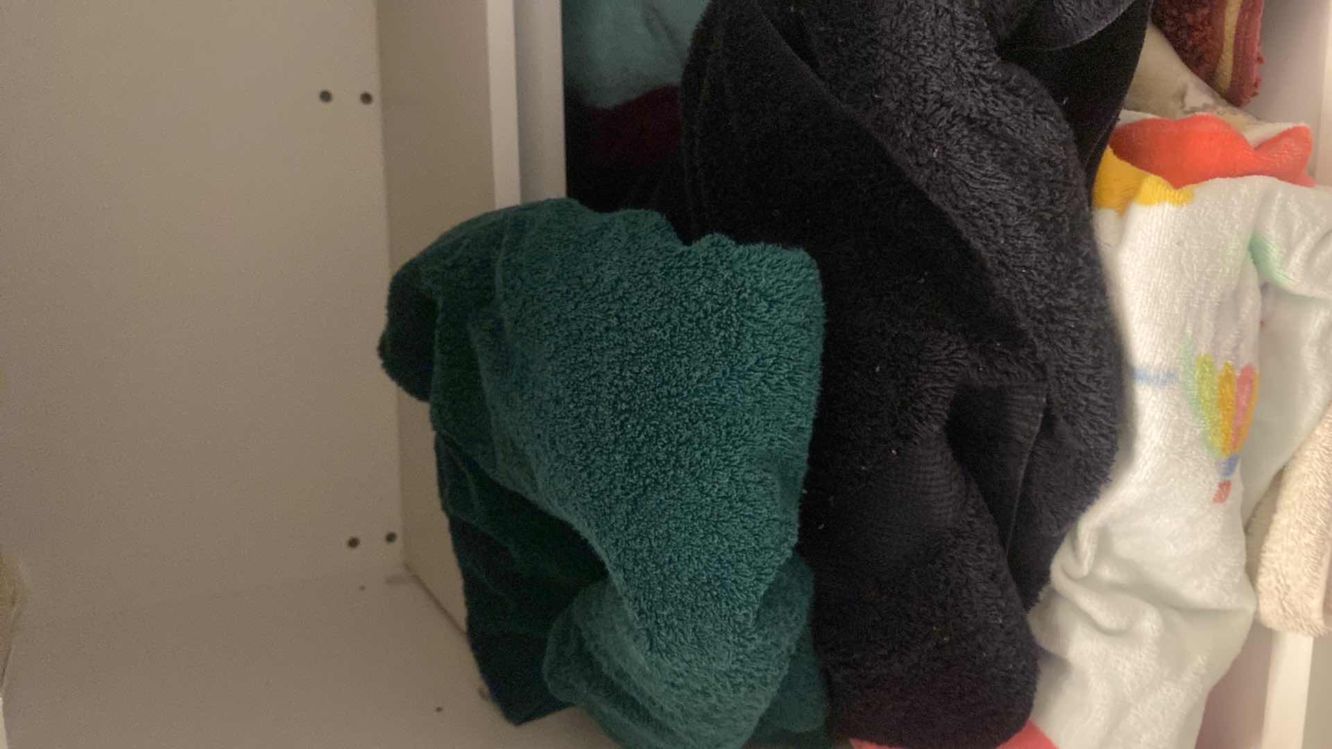 Photo 1 of CONTENTS LAUNDRY ROOM CABINET TOWELS