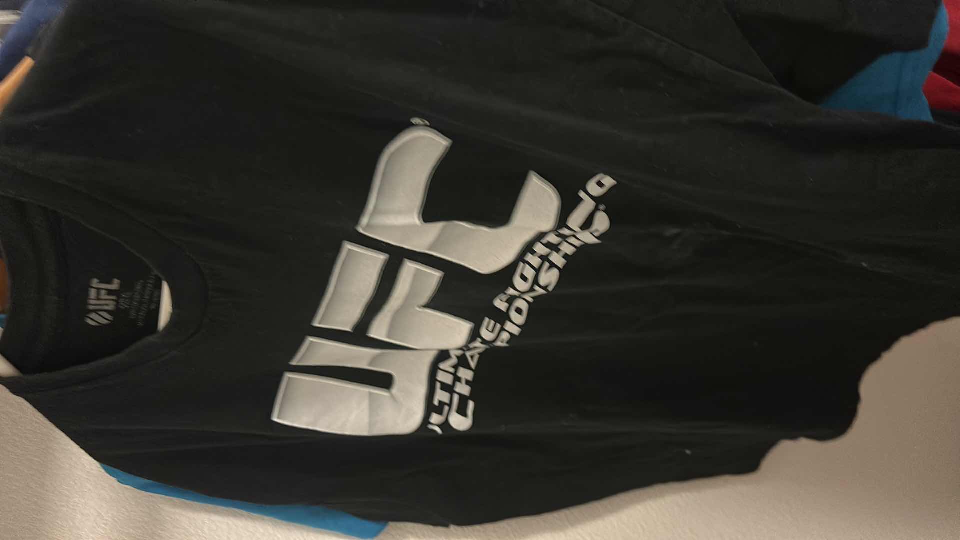 Photo 1 of MENS CLOTHING ASSORTMENT