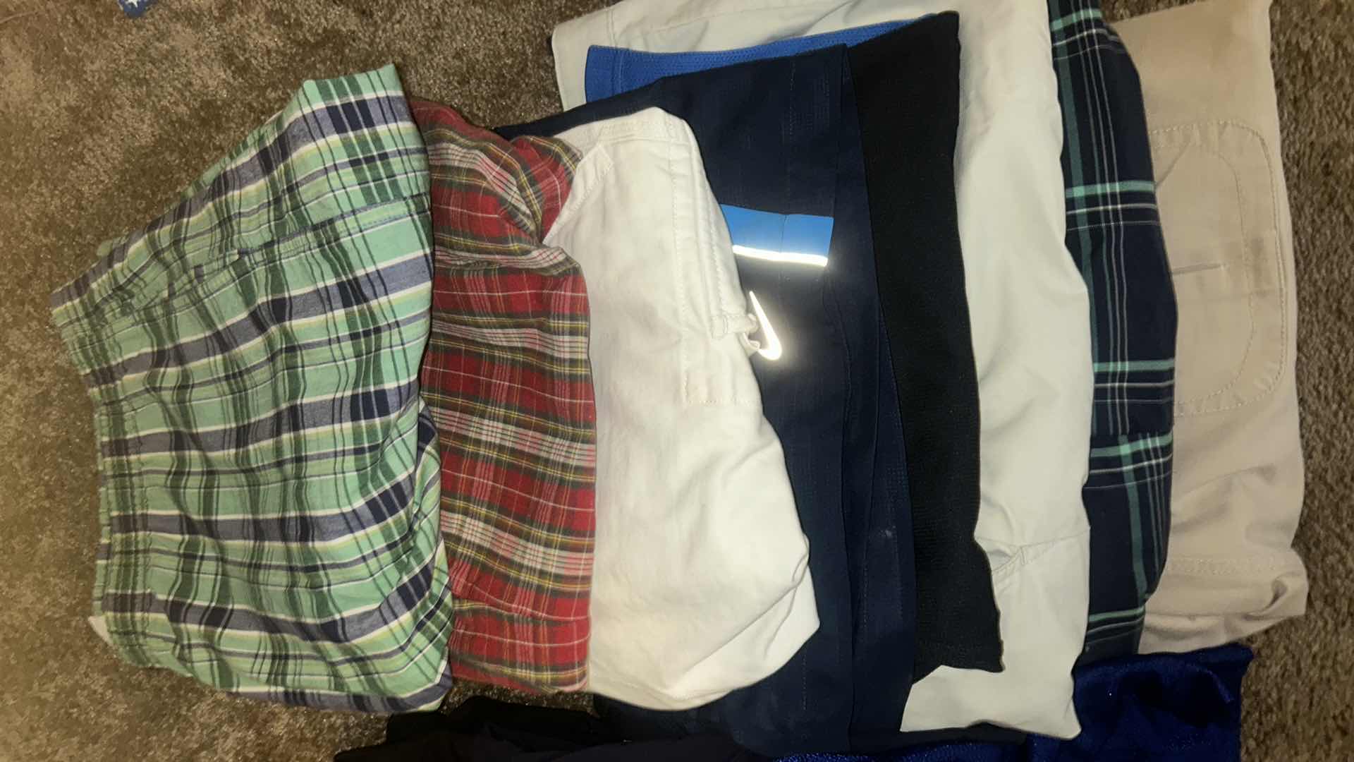 Photo 1 of MENS CLOTHING ASSORTMENT 11 PAIR OF SHORTS ONE ZIP UP HOODIE