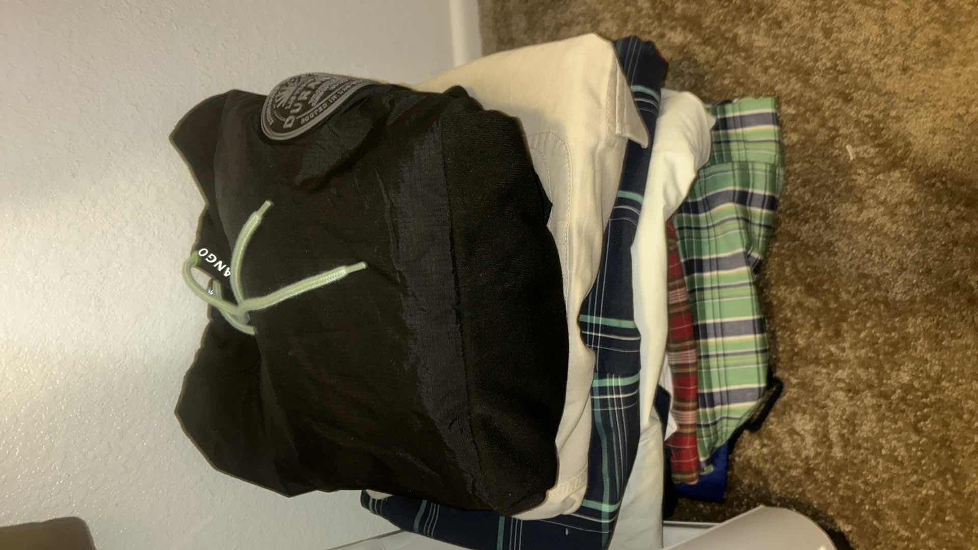 Photo 1 of MENS CLOTHING ASSORTMENT 11 PAIR OF SHORTS ONE ZIP UP HOODIE