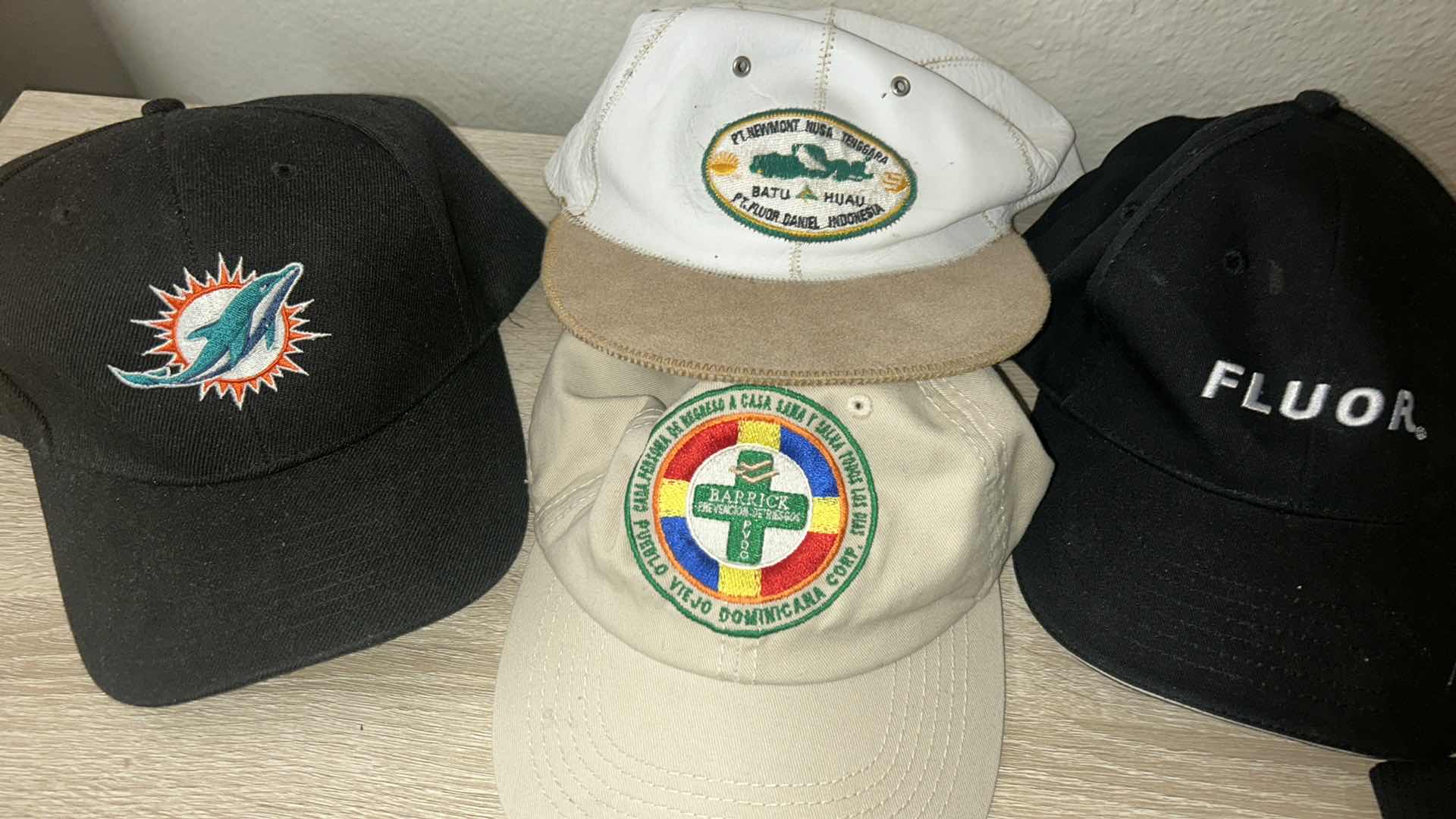 Photo 1 of 4 BASEBALL CAPS AND 3 PAIRS OF GLOVES