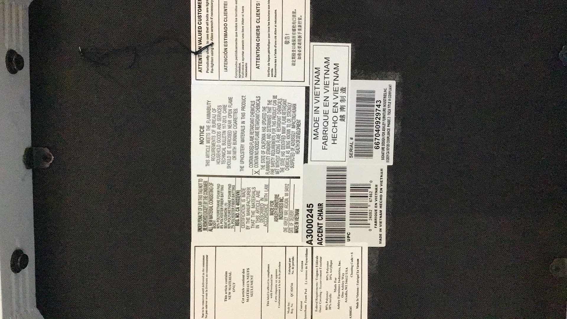 Photo 1 of ASHLEY FURNITURE KORNELIA CHARCOAL PLAID ACCENT CHAIR A3000245 28" X 27" H41.5"