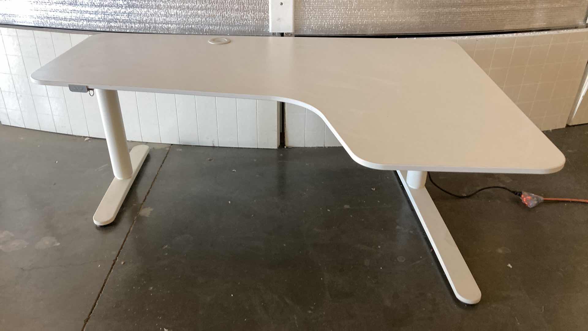 Photo 1 of INTERTEK MOTORIZED ADJUSTABLE HEIGHT L SHAPED DESK WORKSTATION MODEL 5000324 63” X 43.25” H23”-48”