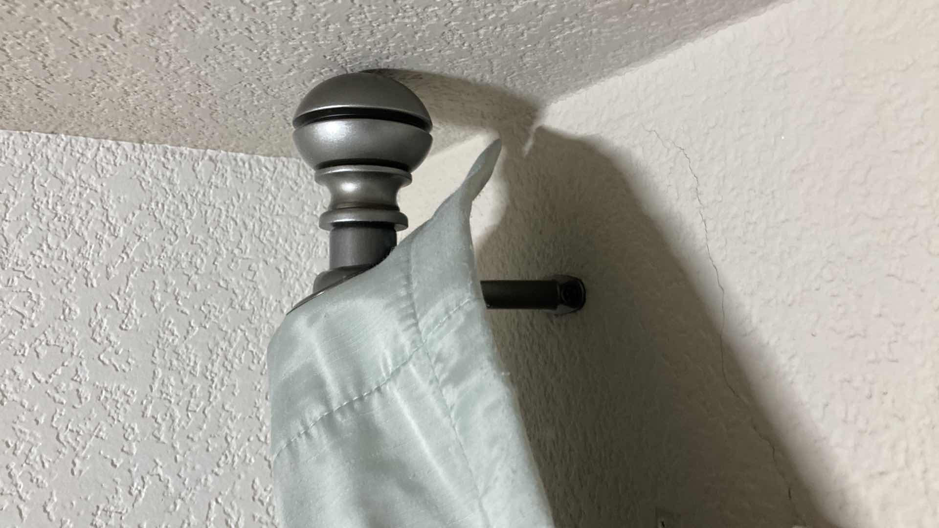 Photo 1 of DKNY POLYESTER DUAL LAYER CURTAIN PANELS (2) 50” X 84” W ADJUSTABLE METAL CURTAIN ROD