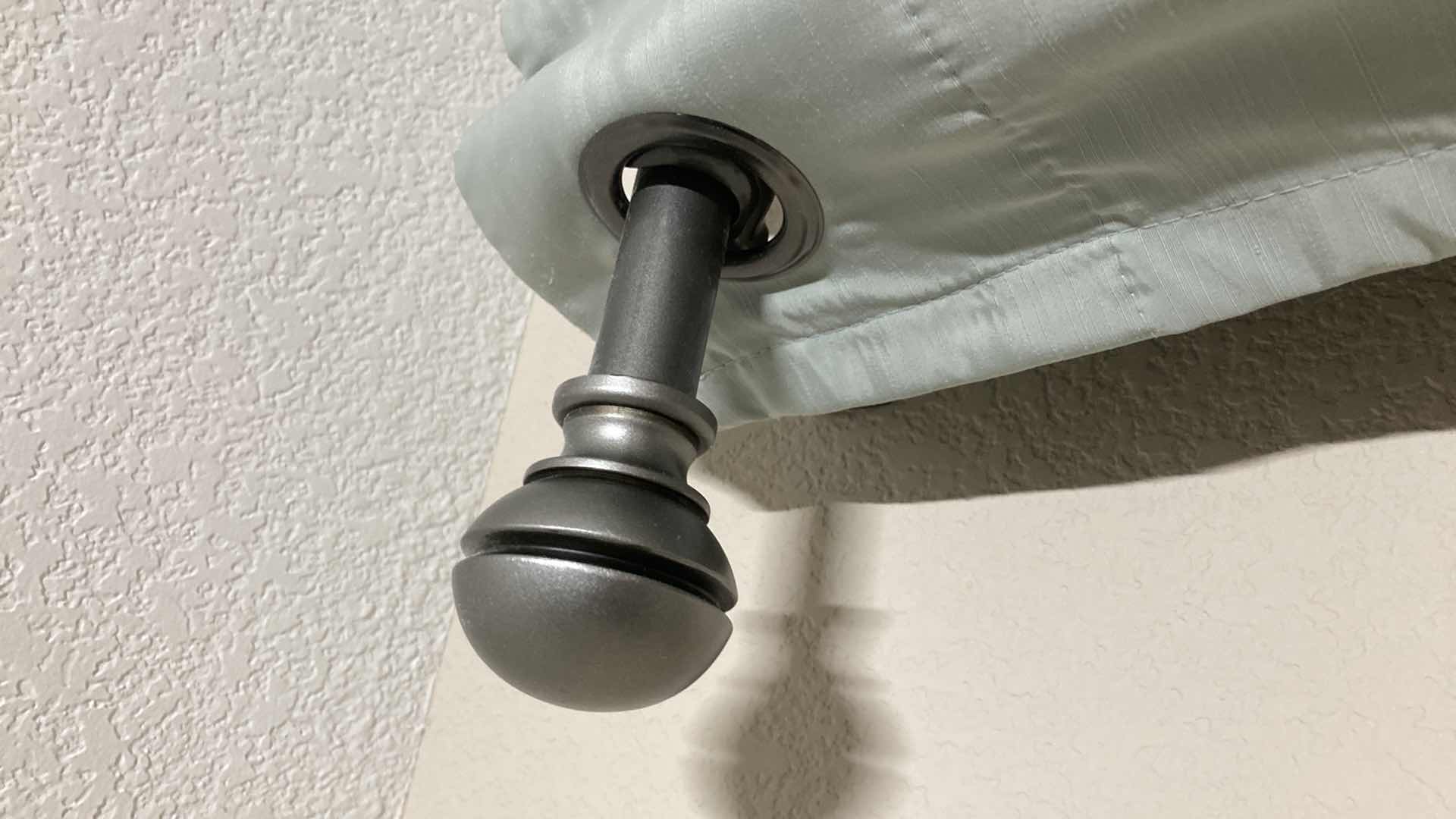 Photo 1 of DKNY POLYESTER DUAL LAYER CURTAIN PANELS (2) 50” X 84” W ADJUSTABLE METAL CURTAIN ROD