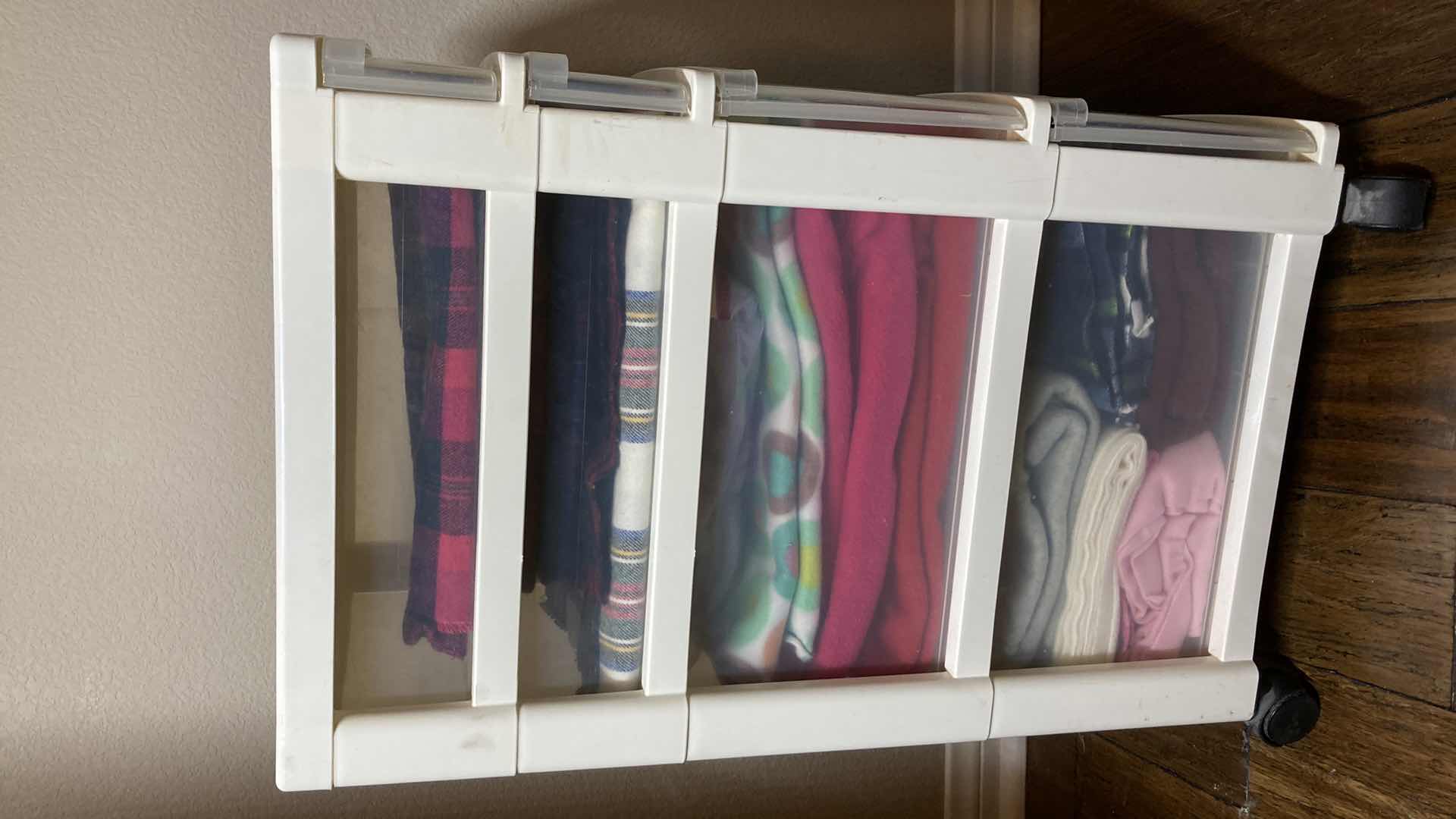 Photo 1 of IRIS ROLLING 4 DRAWER PLASTIC MINI CHEST W FABRIC PARTIALS 12.5”” X 16” H26.5”