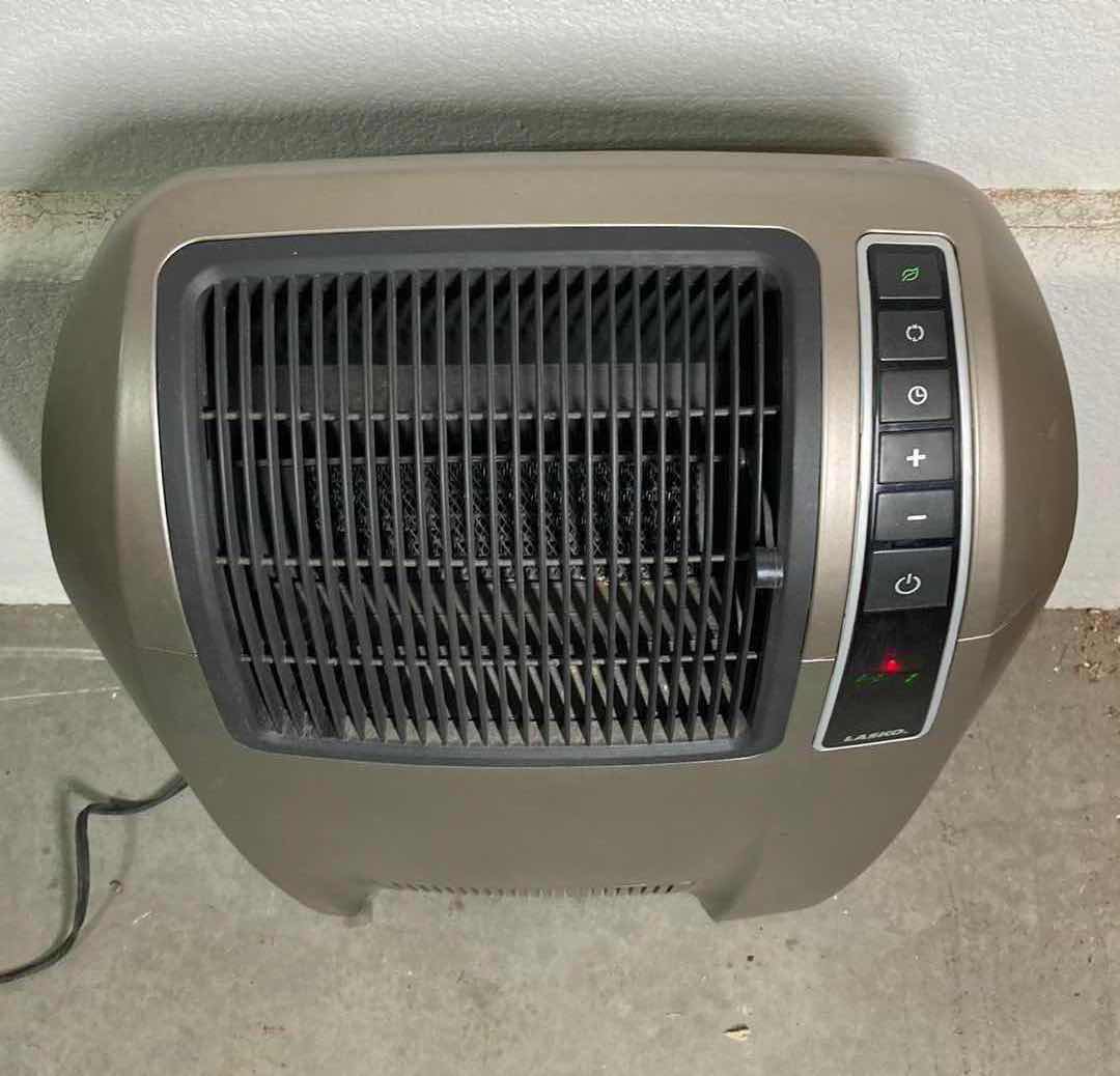 Photo 1 of LASKO MOVABLE AIR HEATER MODEL 5842 W REMOTE